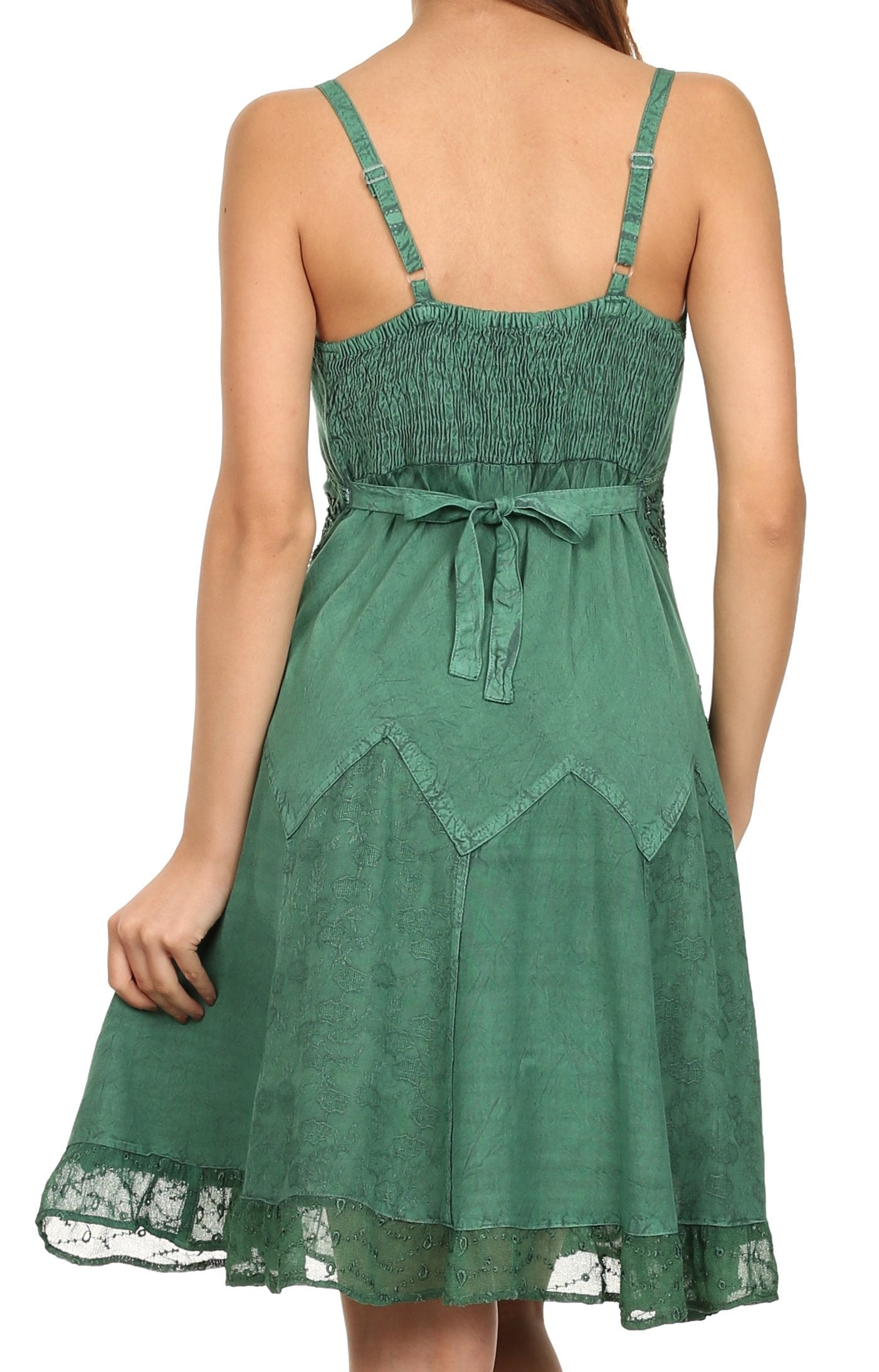 Green dress with lace details on a white background