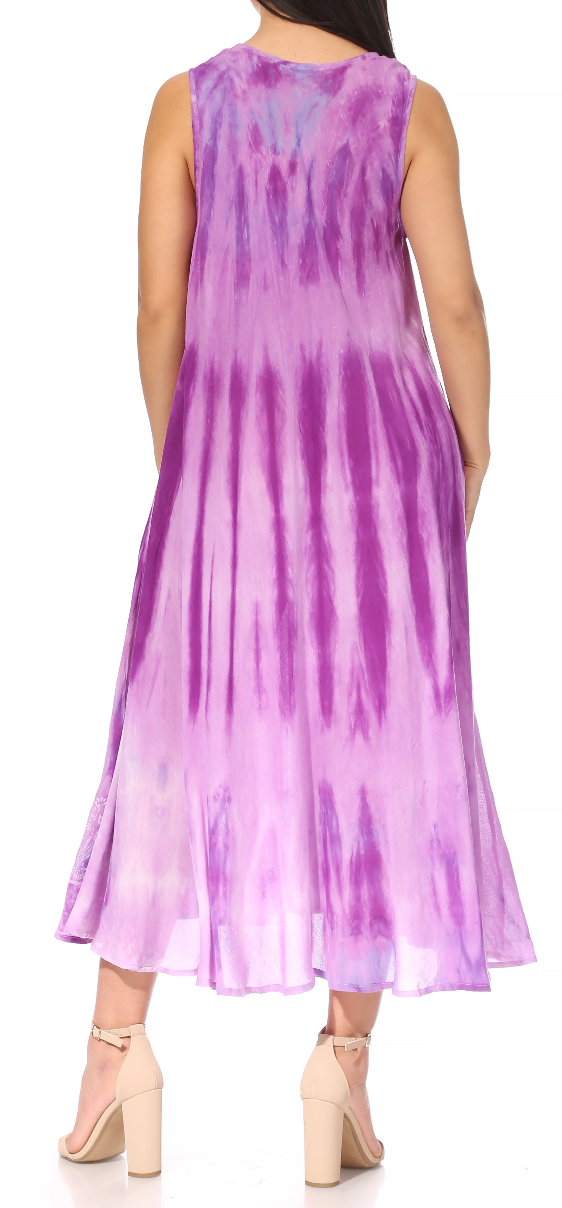 Woman wearing a sleeveless purple tie-dye dress.