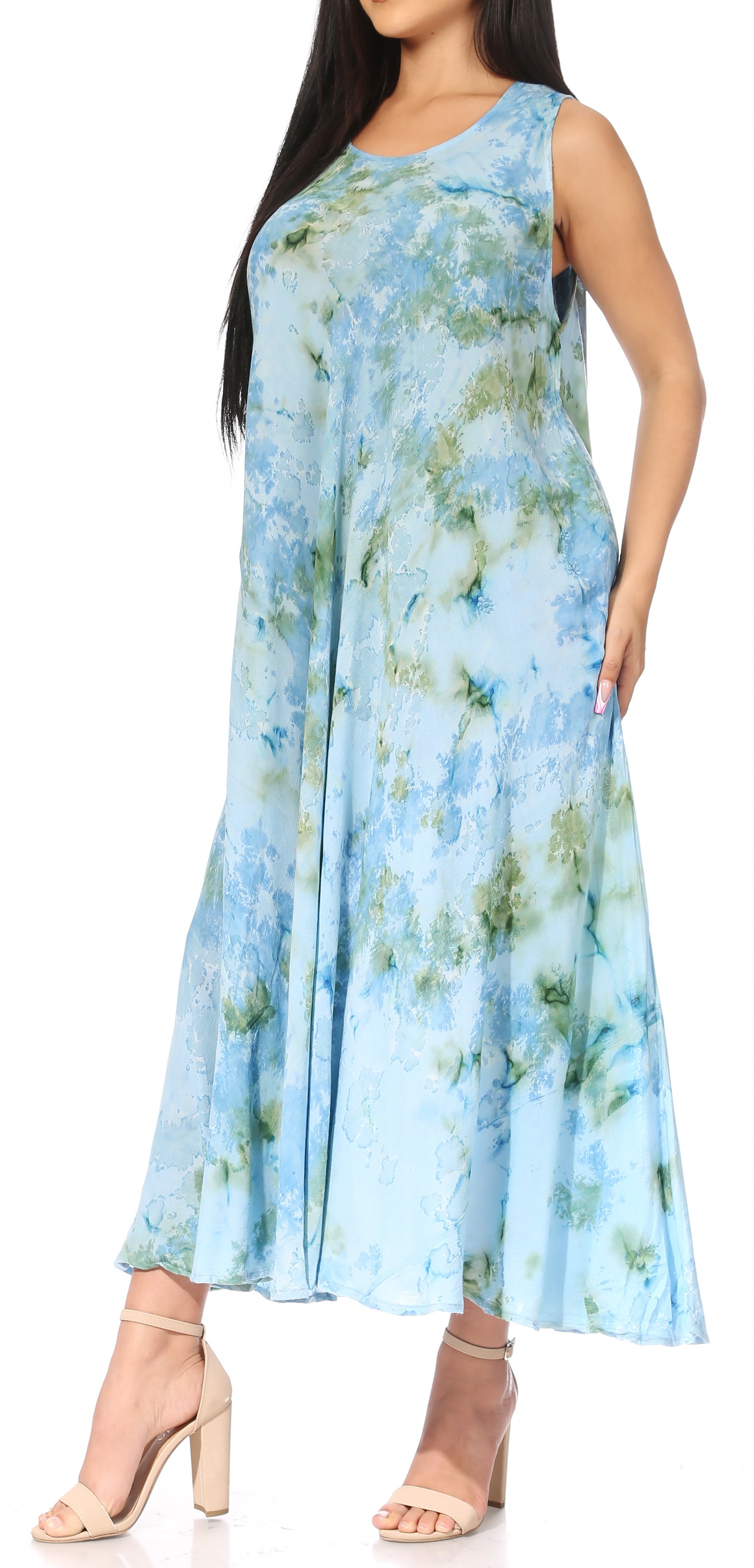 Woman wearing a light blue floral dress on a white background