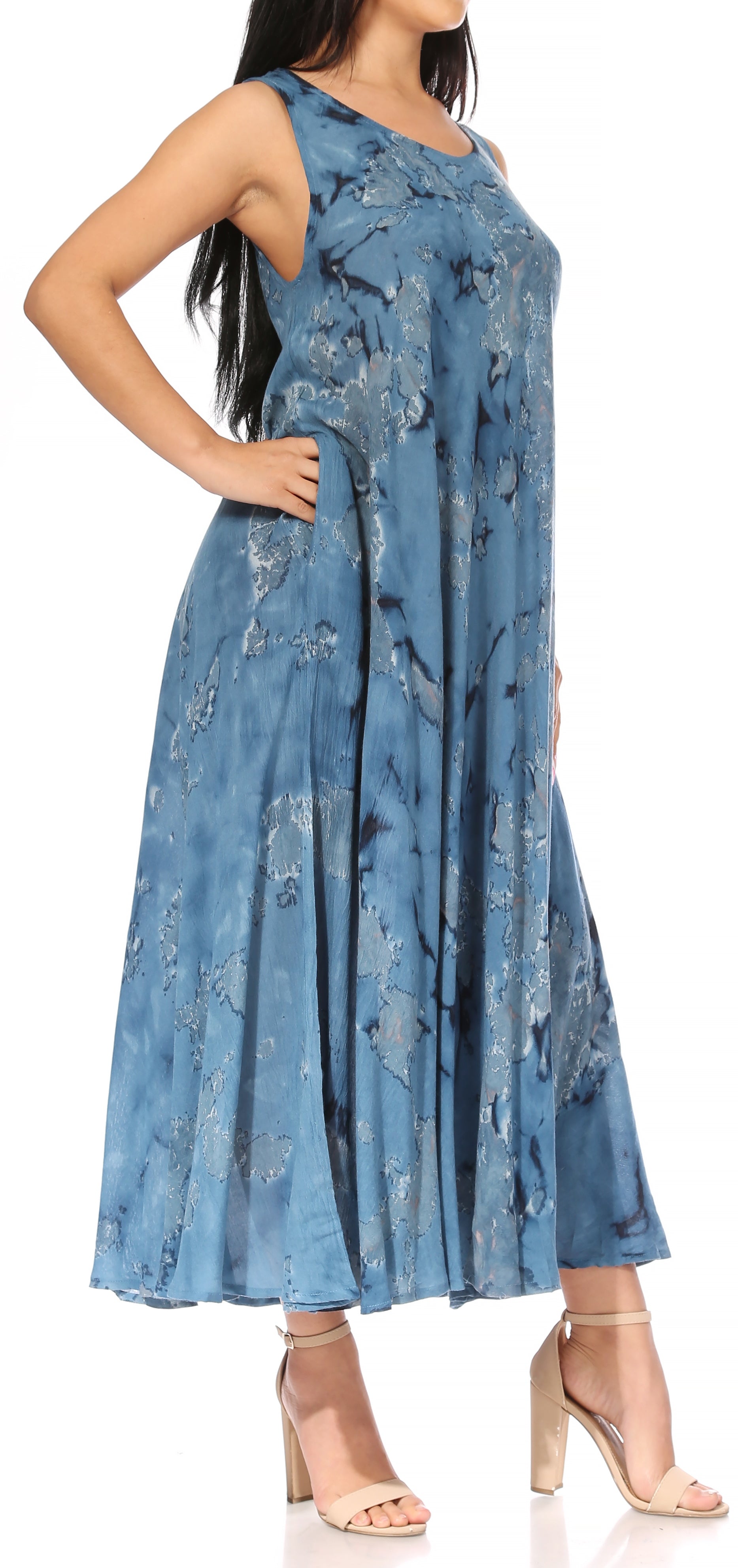 Woman wearing a blue floral dress on a white background