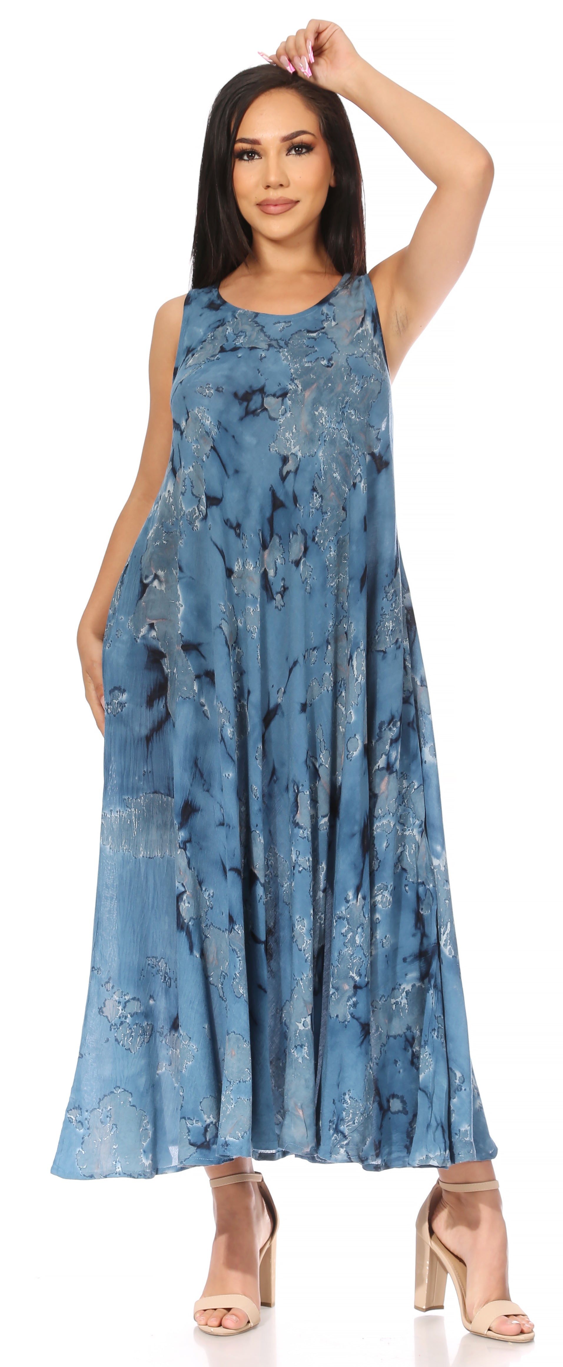 Woman wearing a blue floral dress on a white background