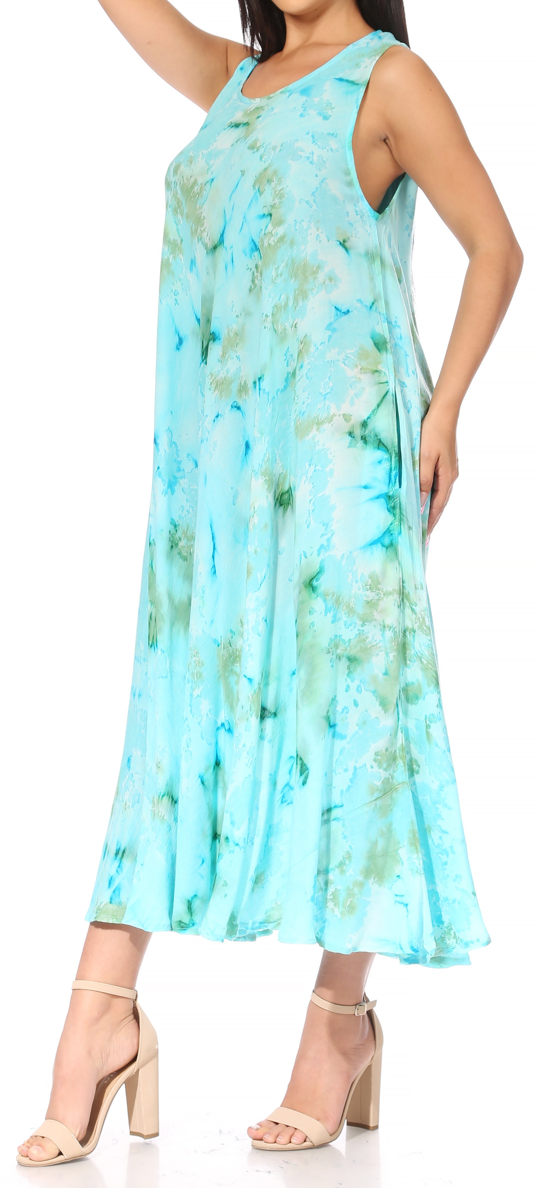 Woman wearing a light blue floral dress on a white background