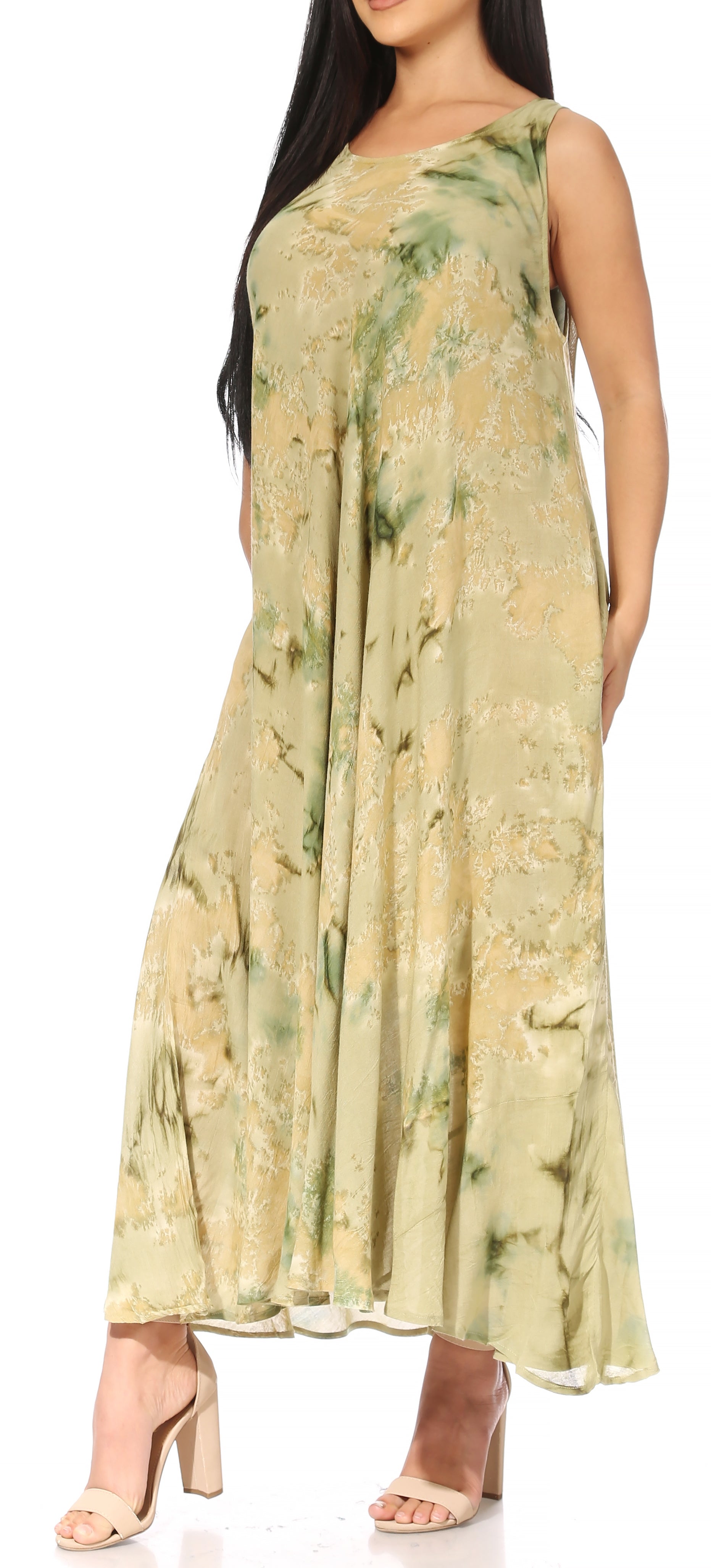 Woman wearing a floral one-shoulder dress with a white background