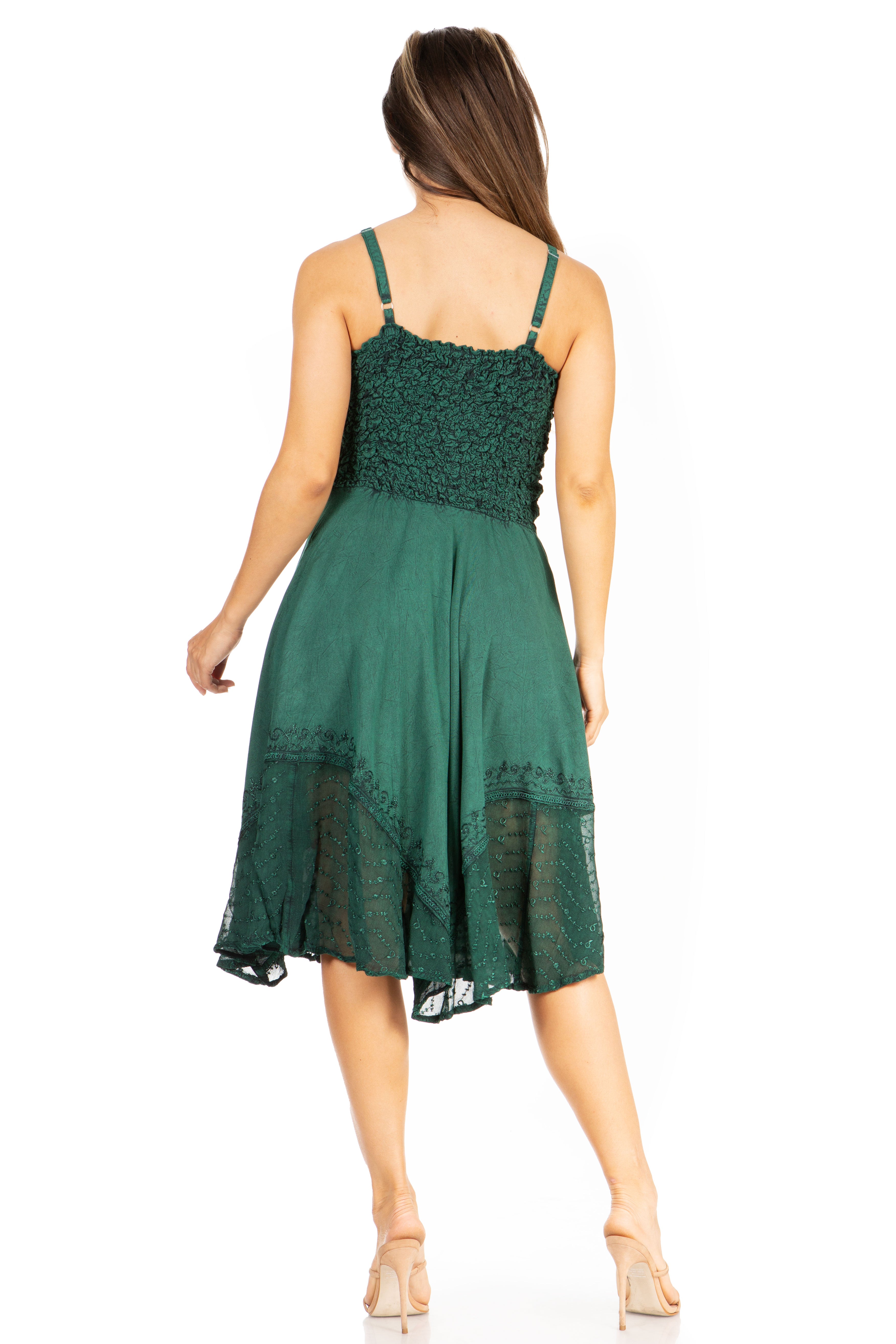 Green dress with lace details on a white background