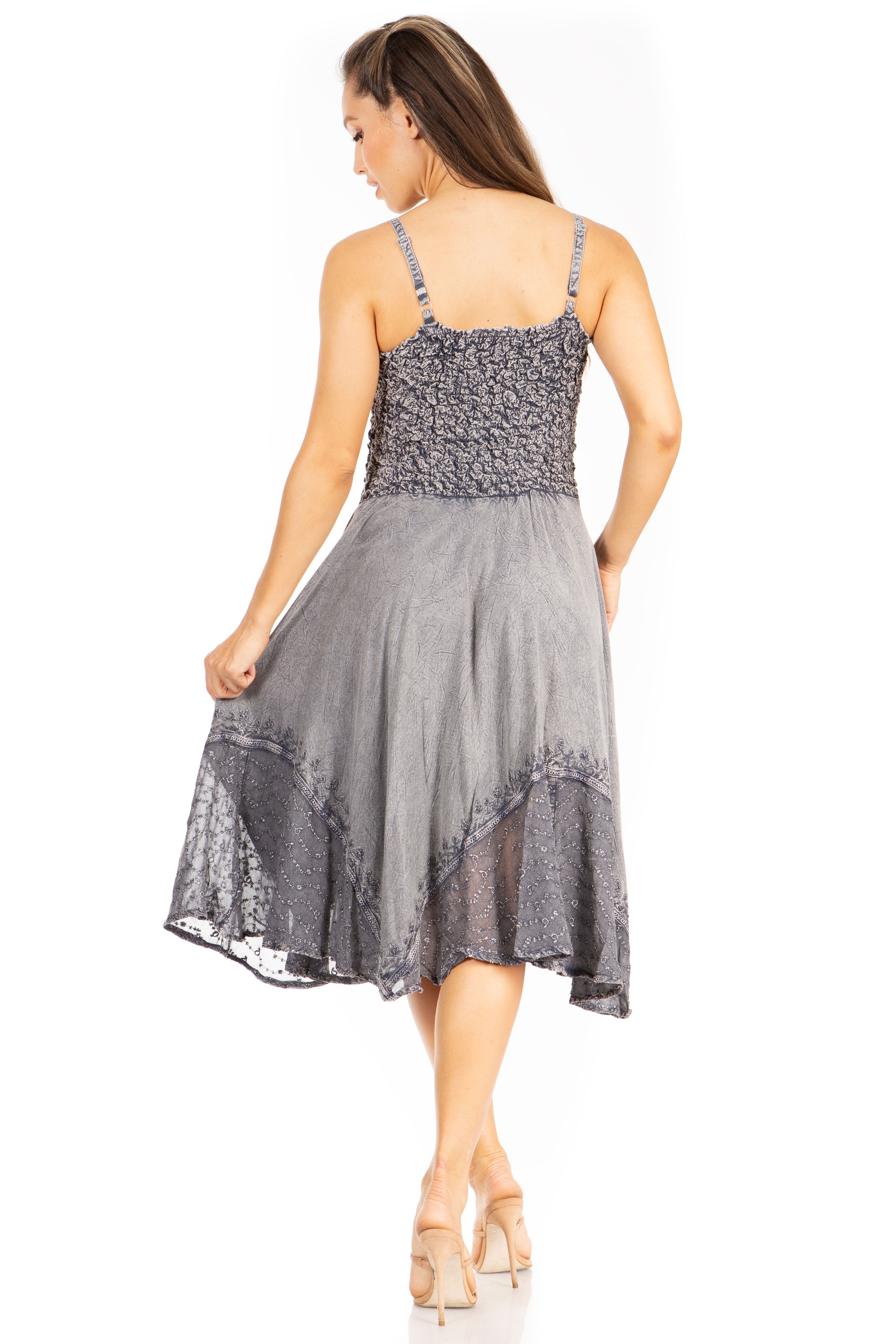 Woman wearing a gray lace dress on a white background