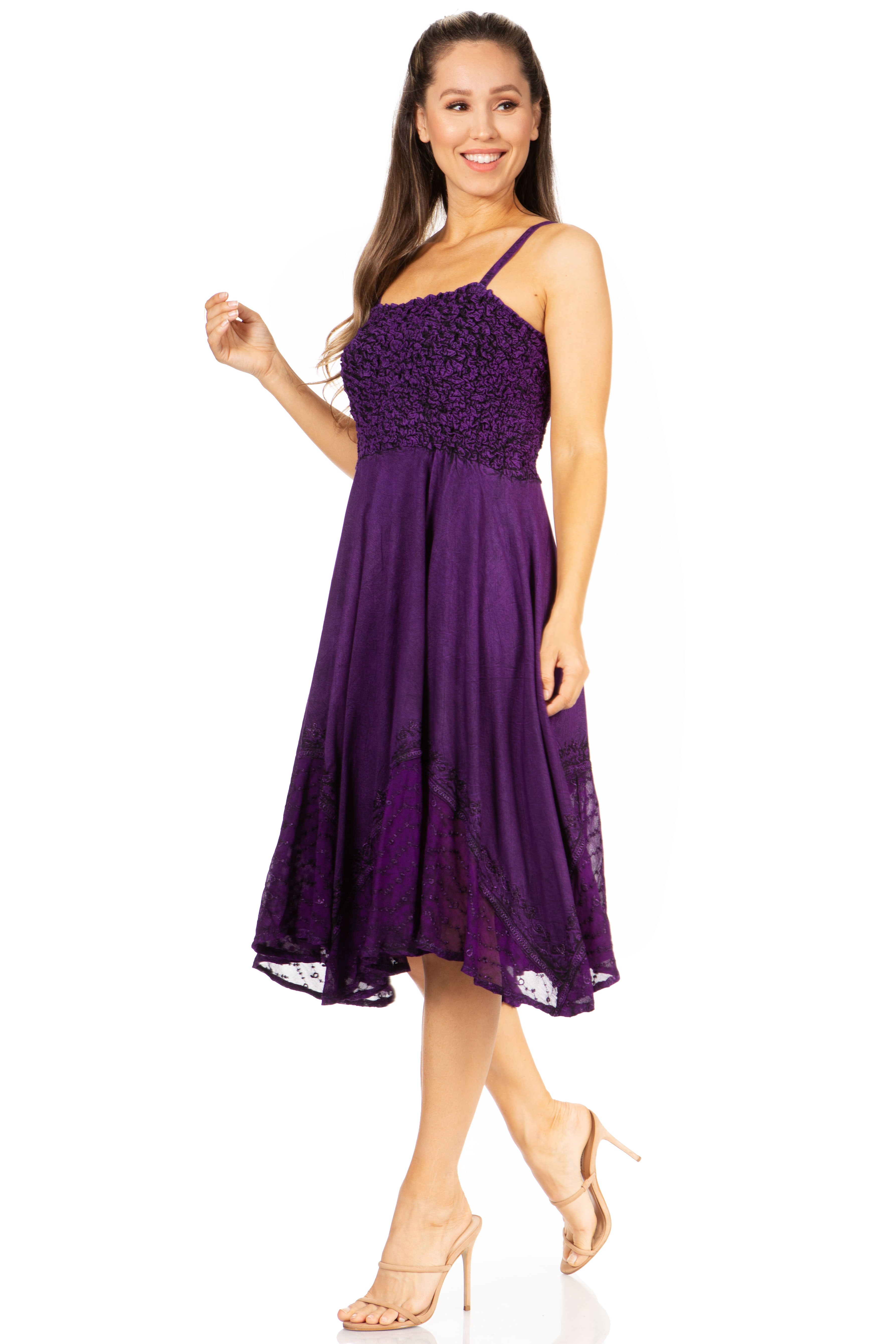 Woman wearing a purple dress on a white background