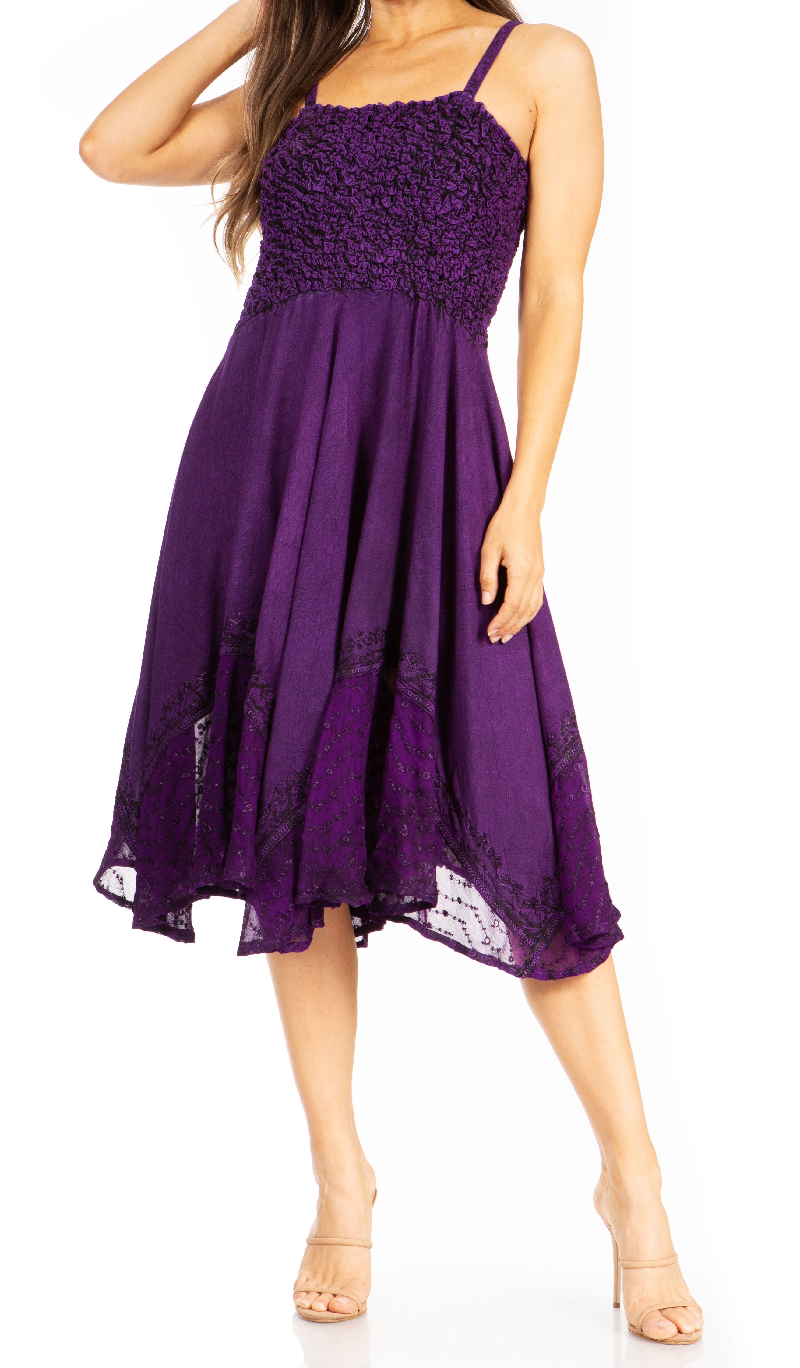 Purple lace dress worn by a model on a white background
