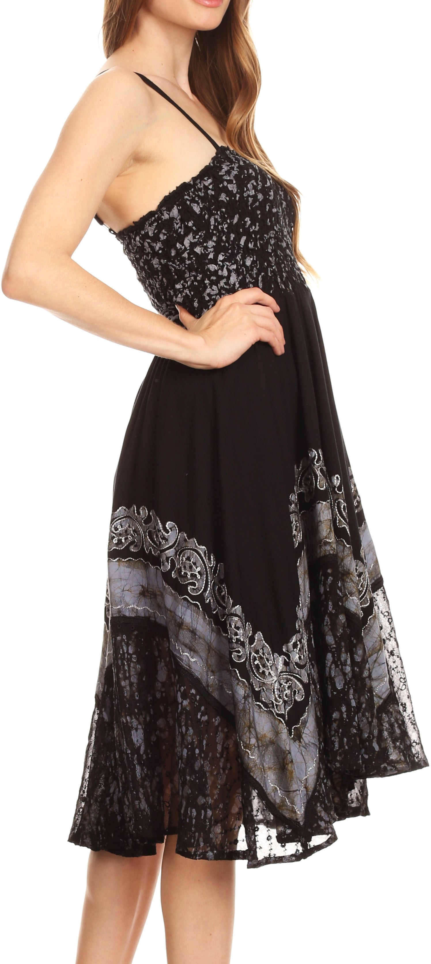 Black dress with floral patterns on a white background