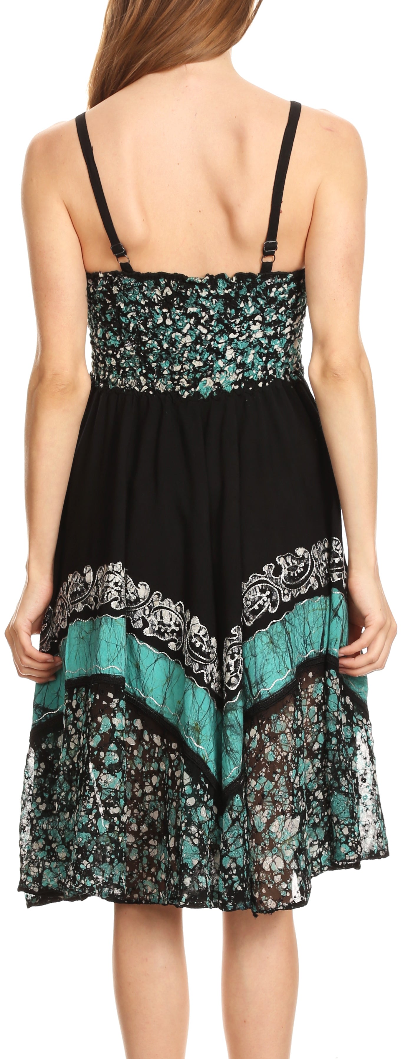 Black and teal patterned dress with thin straps on a white background