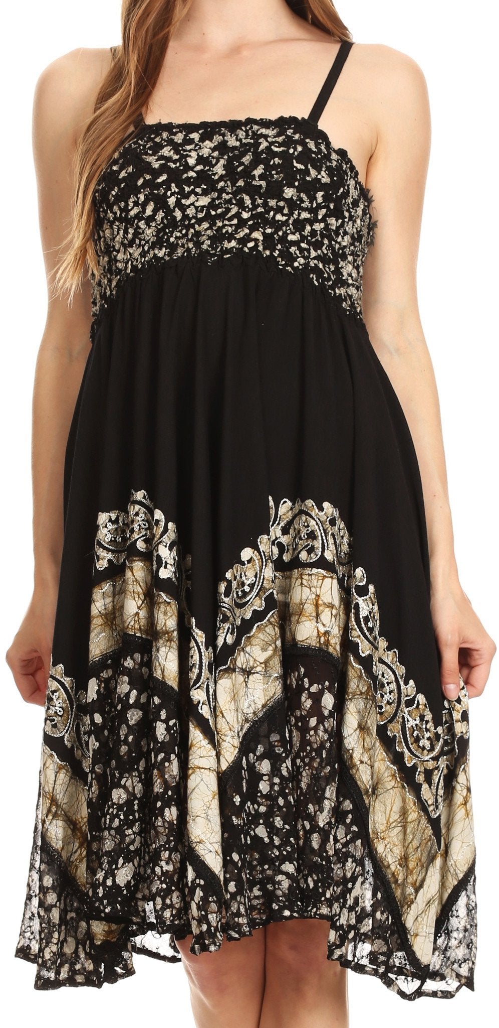 Black dress with intricate gold patterns on a white background