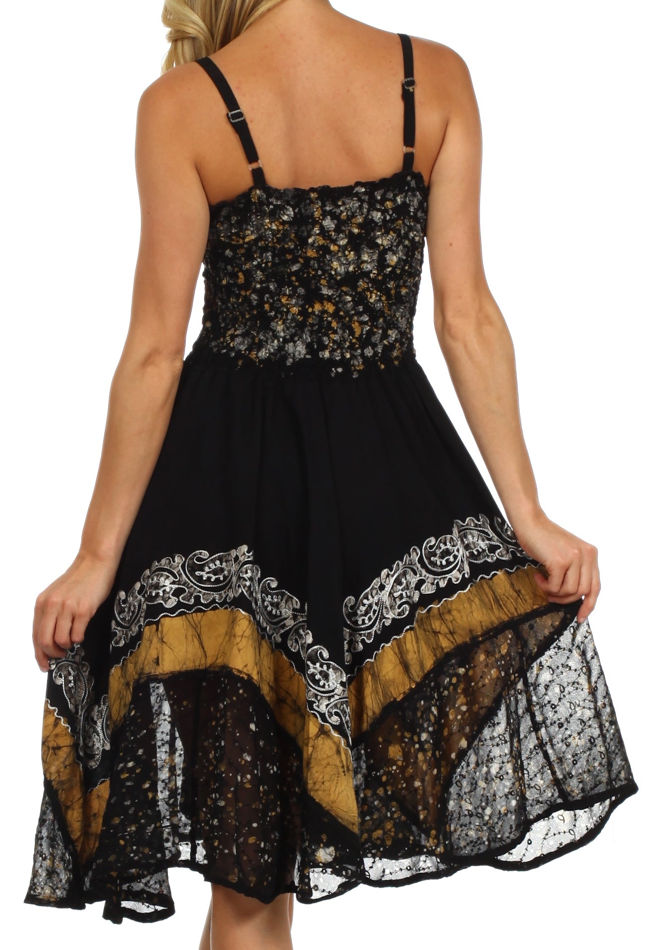 Black lace dress with floral patterns on a white background