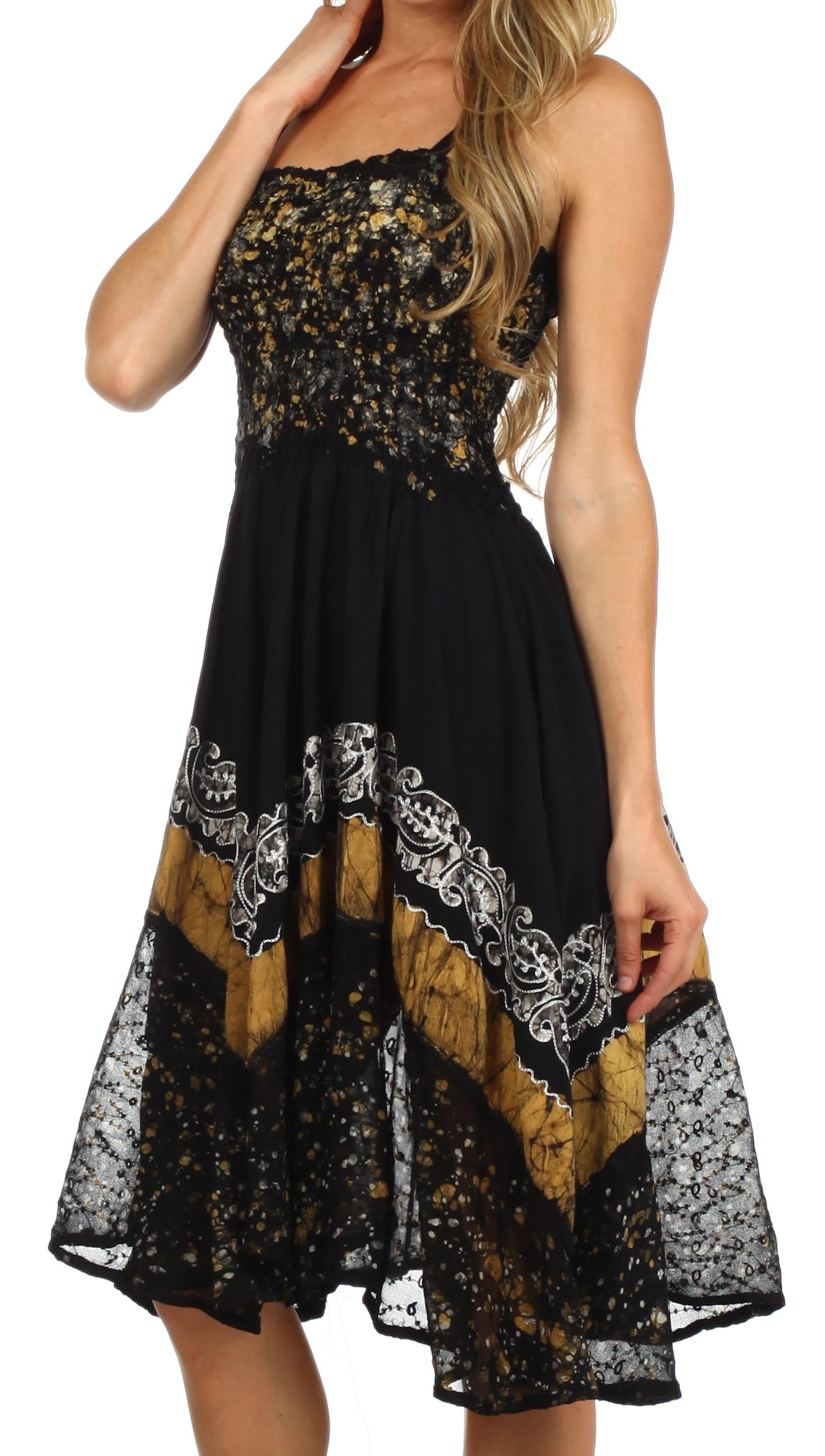 Black and gold patterned dress on a white background