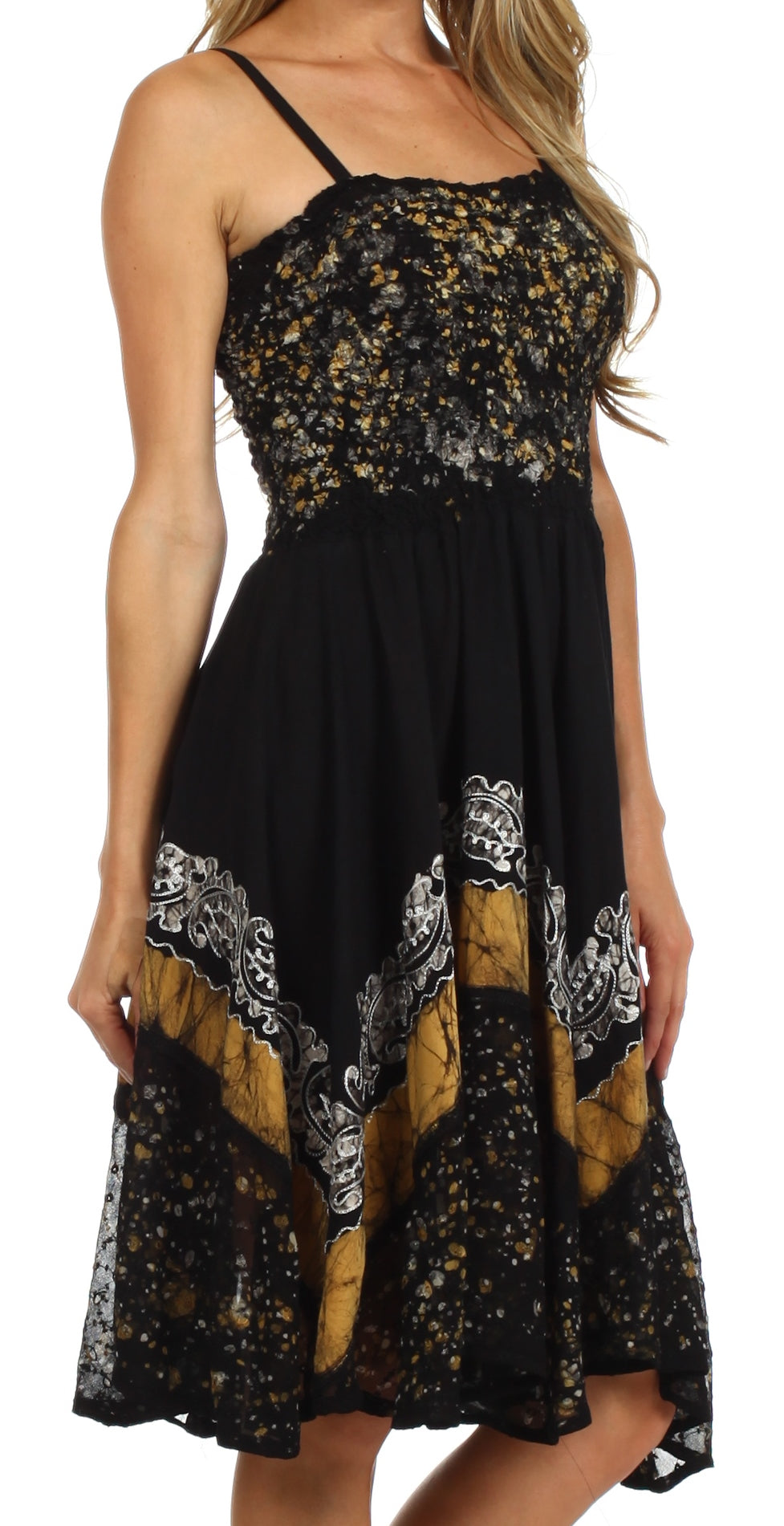 Black lace dress with gold and white patterns on a white background