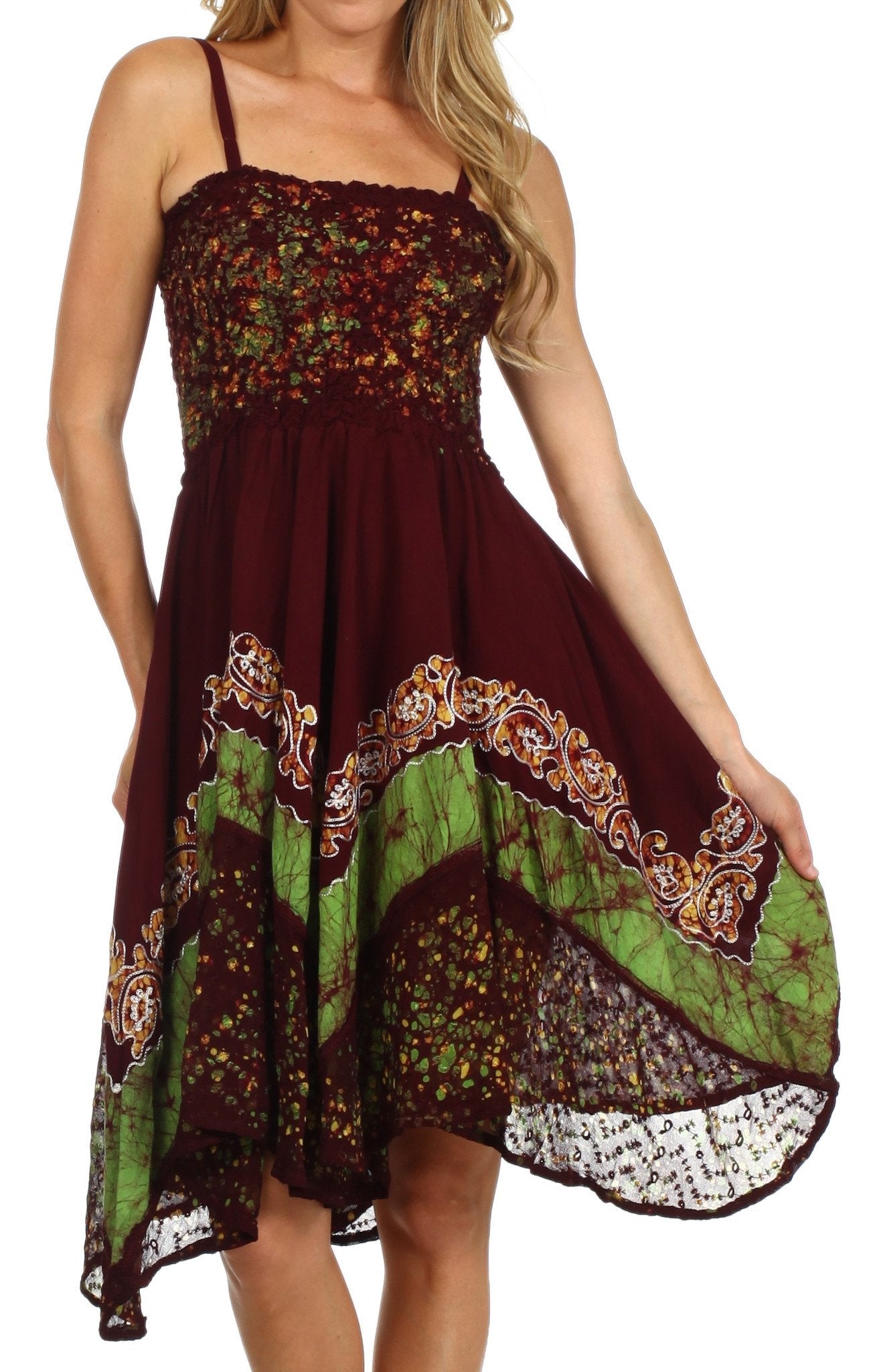 Woman wearing a burgundy dress with green and white patterns on a white background