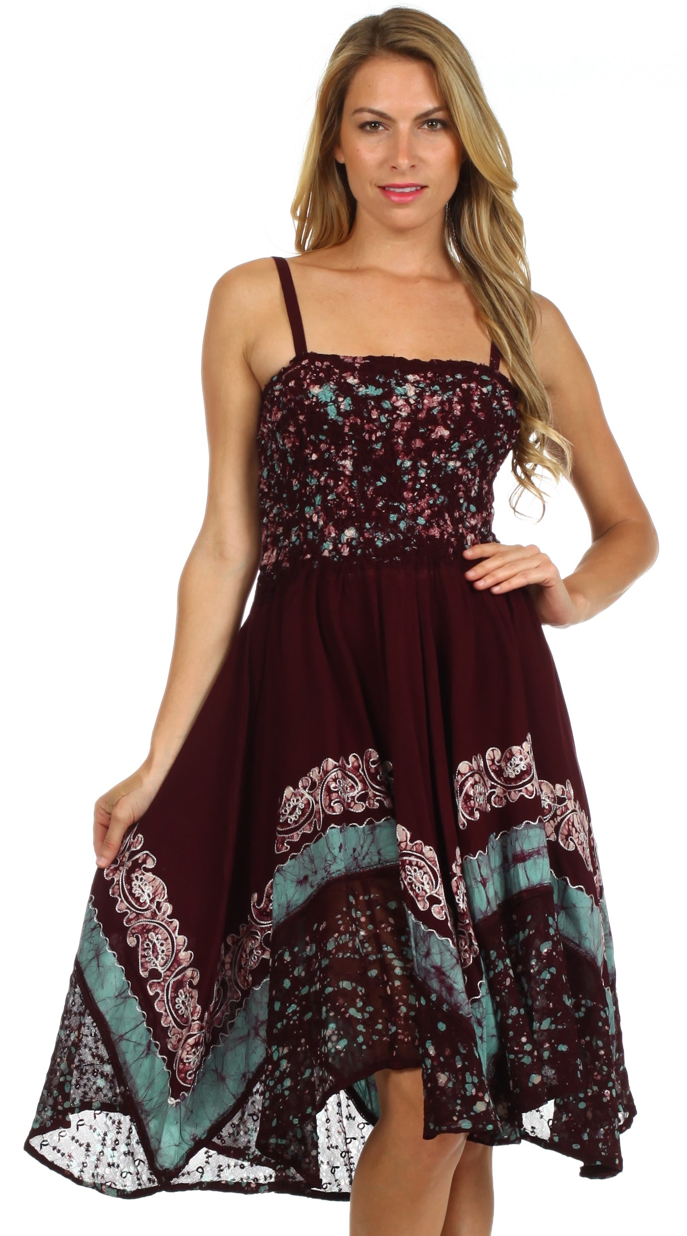 Woman wearing a burgundy floral dress with lace details on a white background
