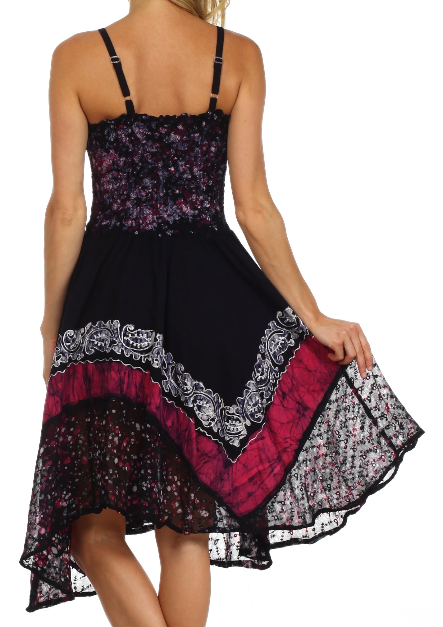 Black dress with floral and lace details on a white background