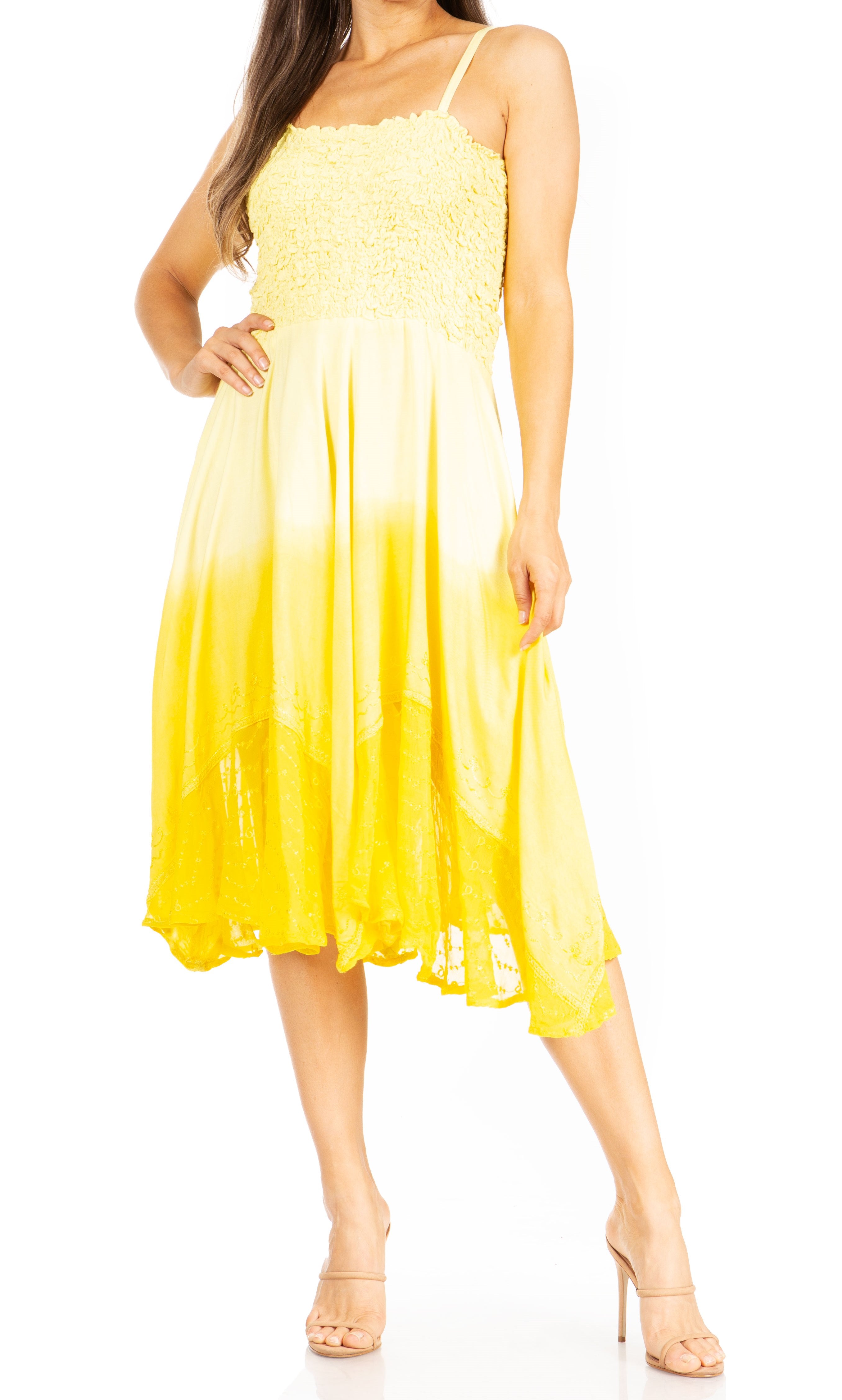 Woman wearing a yellow gradient dress on a white background