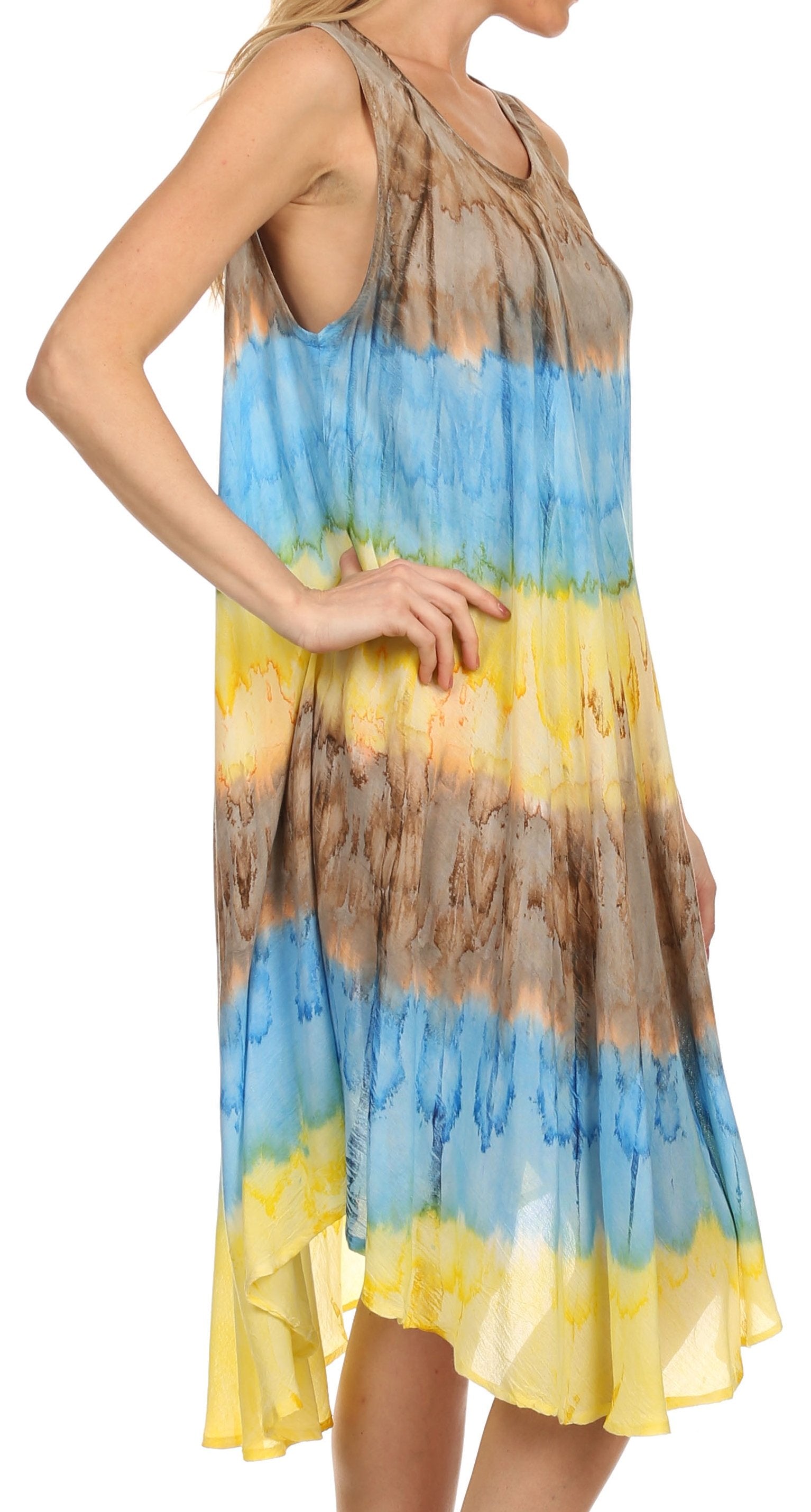 Woman wearing a colorful tie-dye dress on a white background