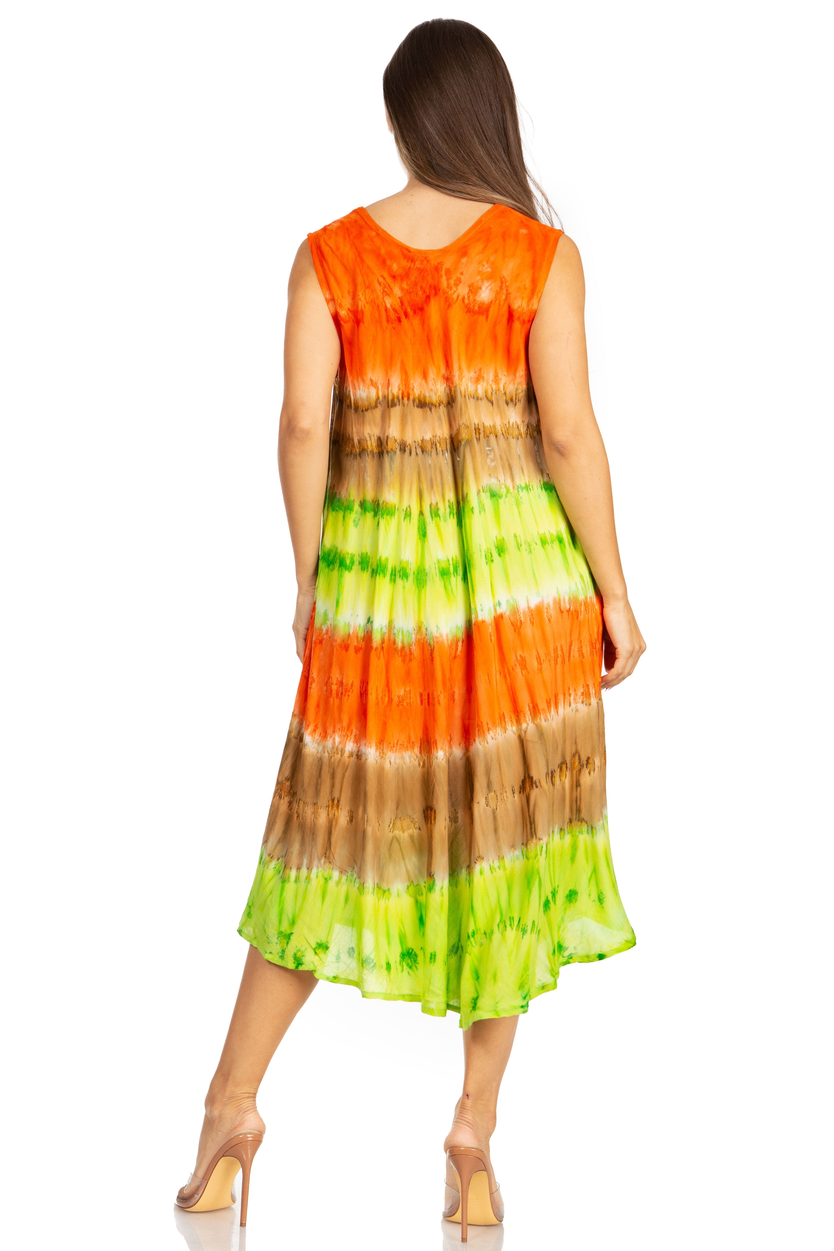 Woman wearing a tie-dye dress with orange, green, and brown colors on a white background