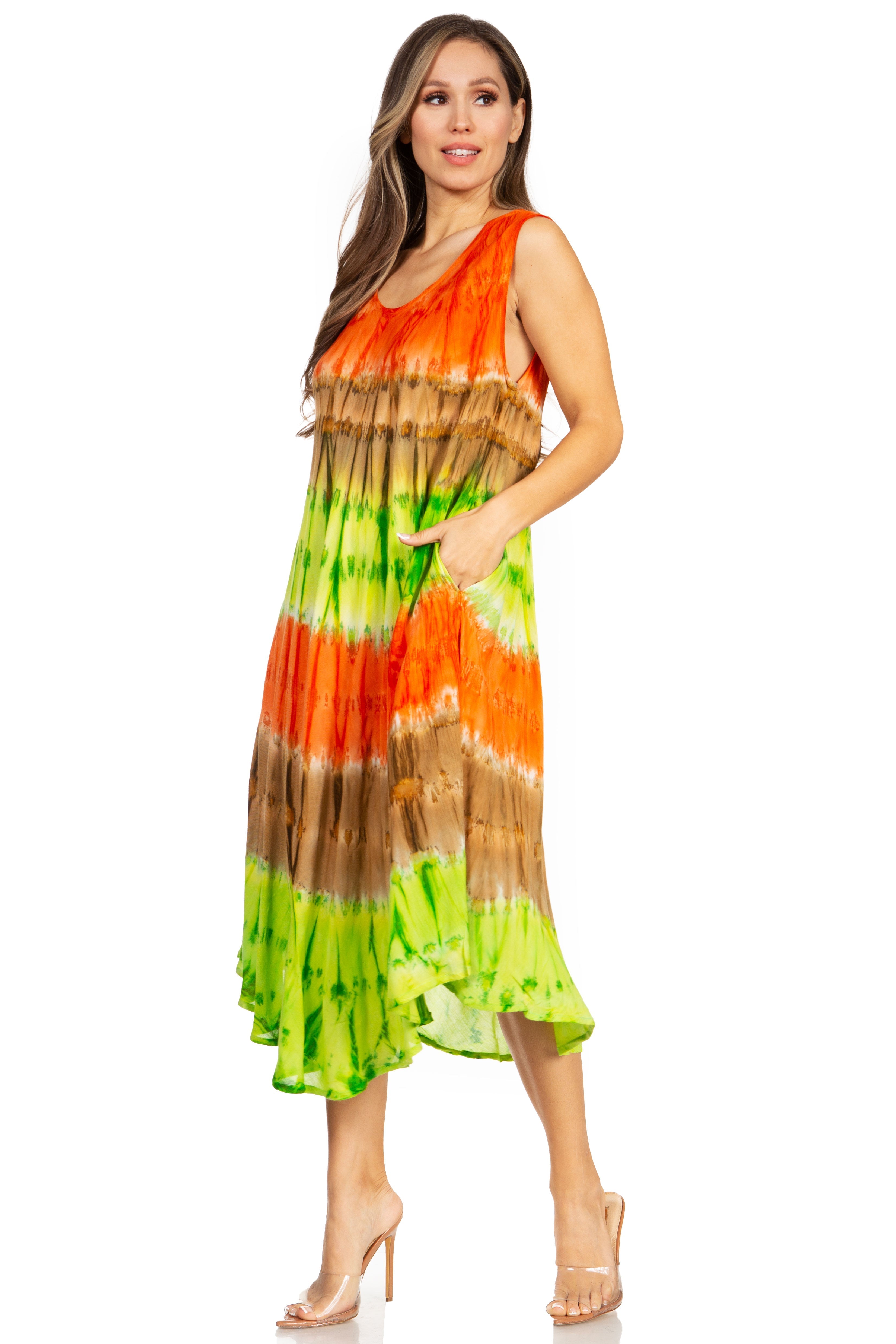 Woman wearing a tie-dye dress with orange, green, and brown colors on a white background