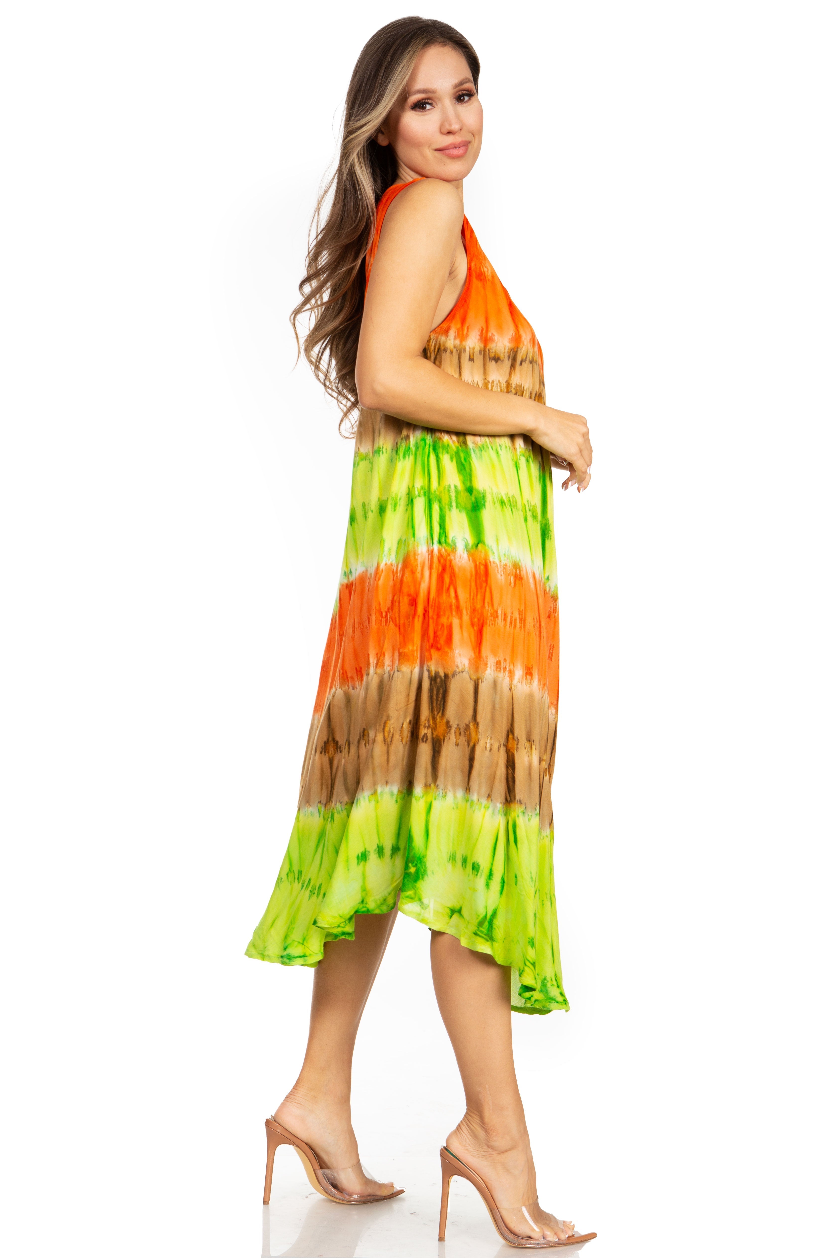 Woman wearing a colorful tie-dye dress on a white background