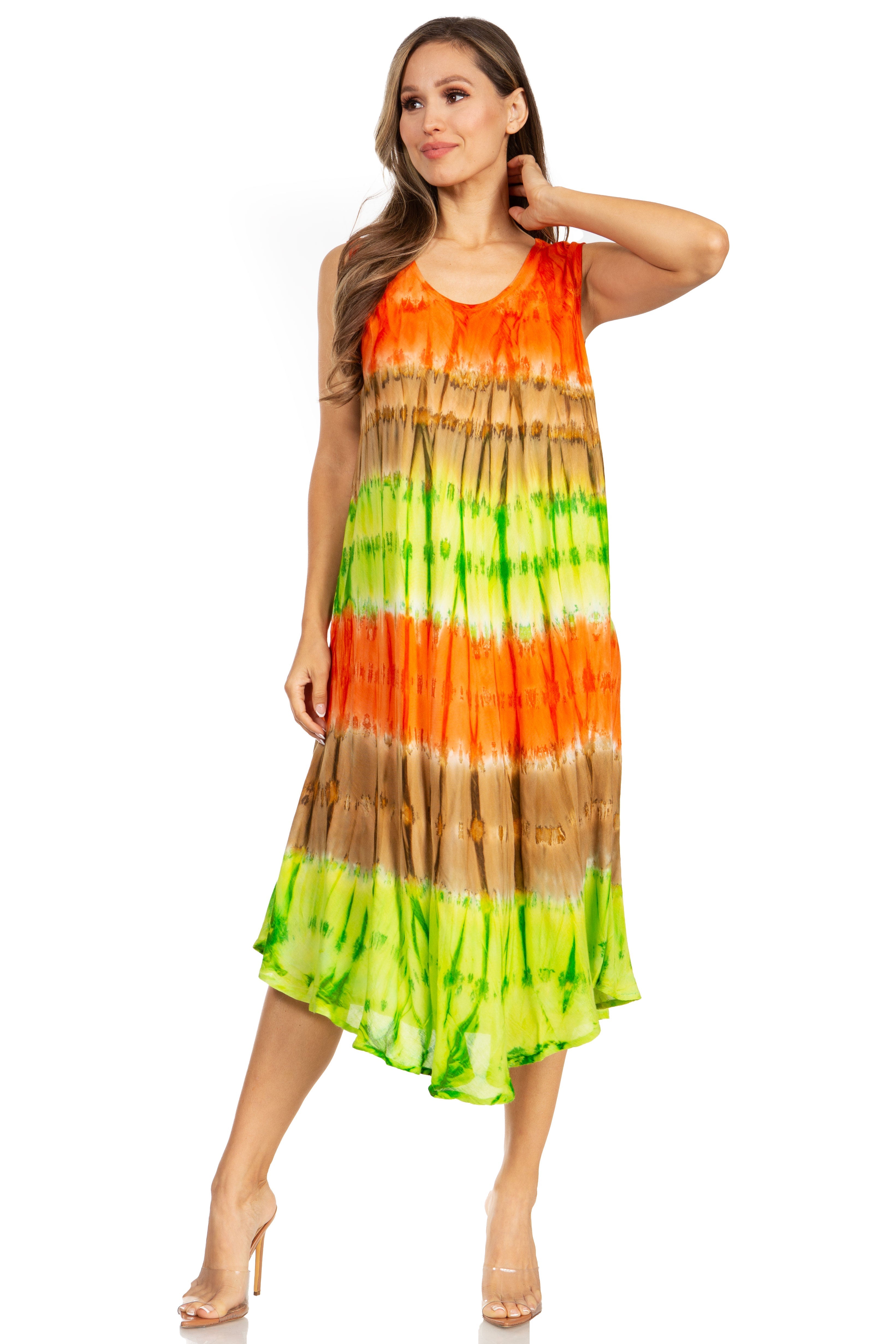 Woman wearing a tie-dye dress with orange, green, and brown colors on a white background