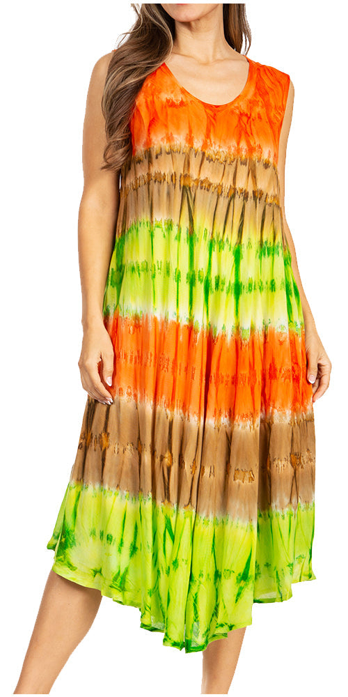 Woman wearing a tie-dye dress with orange, green, and brown colors on a white background
