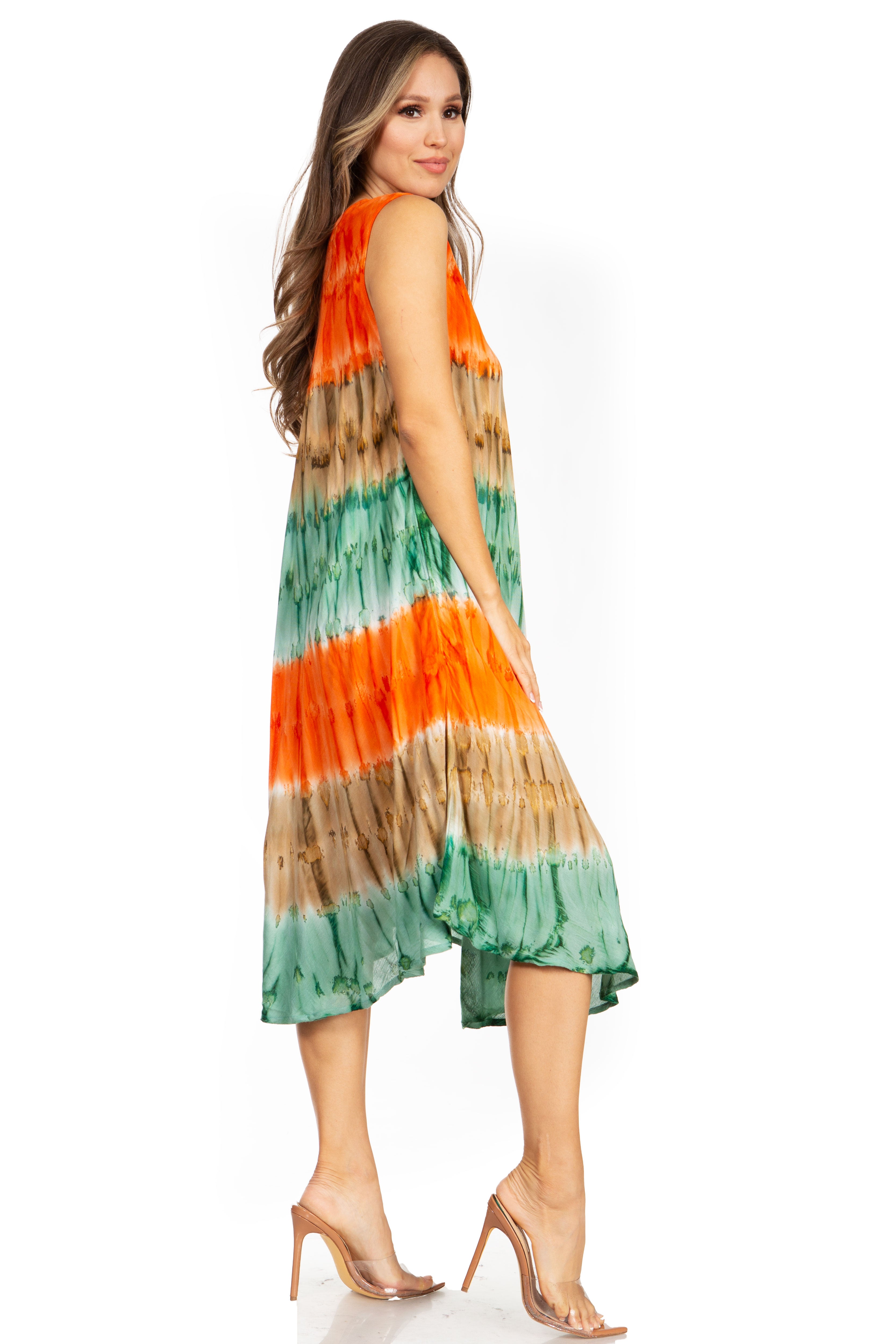 Woman wearing a colorful tie-dye dress on a white background