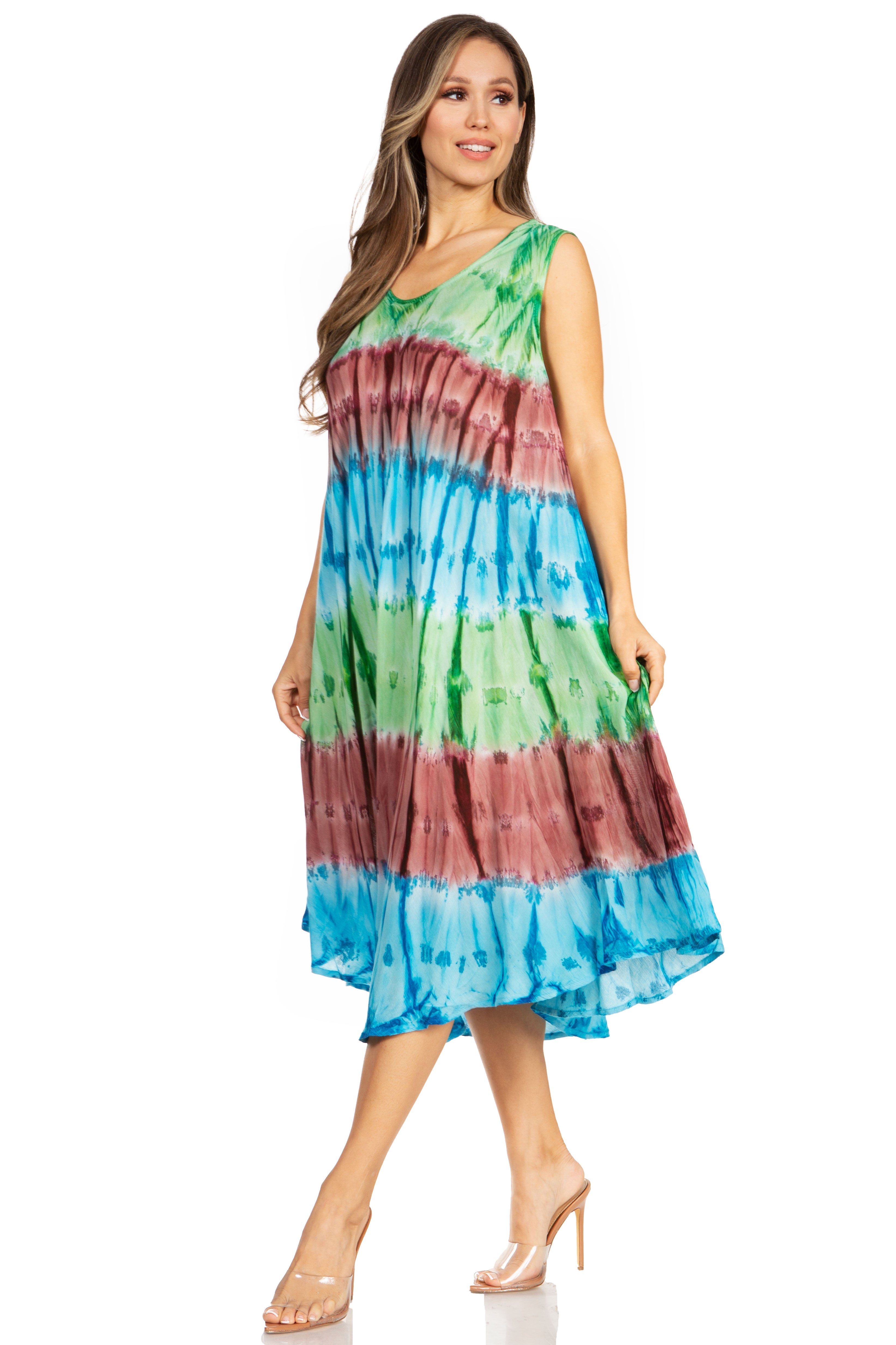 Woman wearing a colorful tie-dye dress on a white background