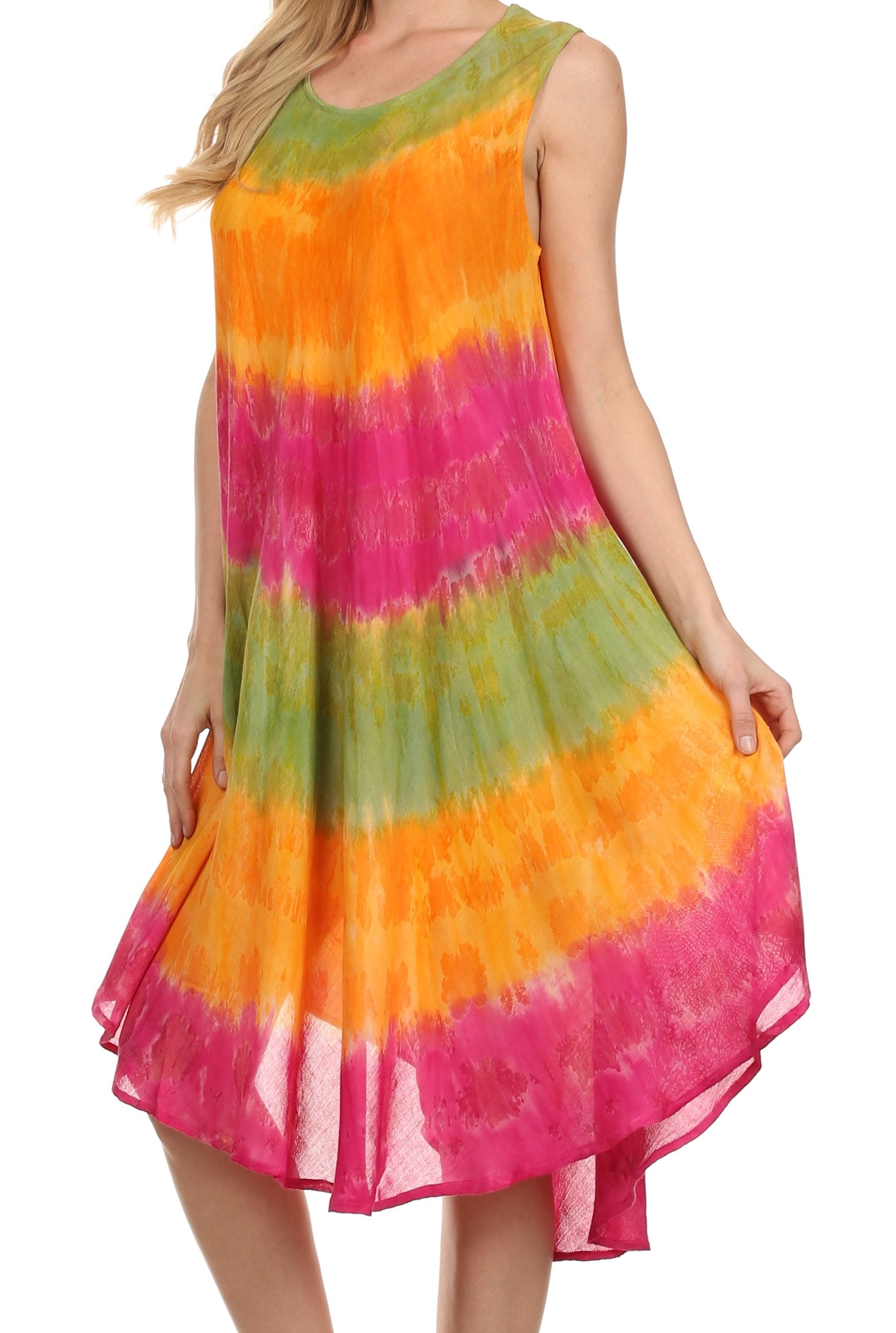 Woman wearing a colorful tie-dye dress on a white background