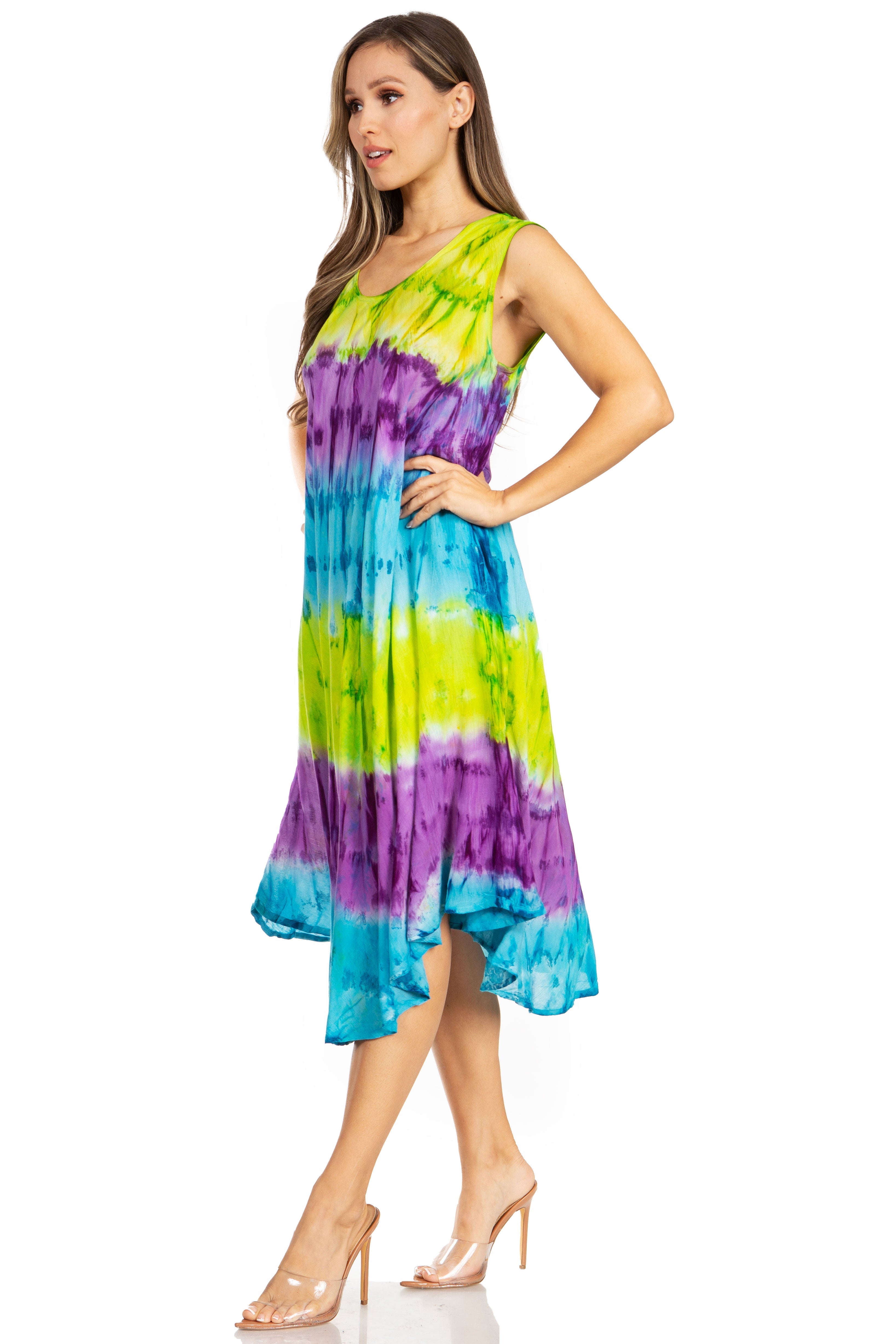 Woman wearing a colorful tie-dye dress on a white background