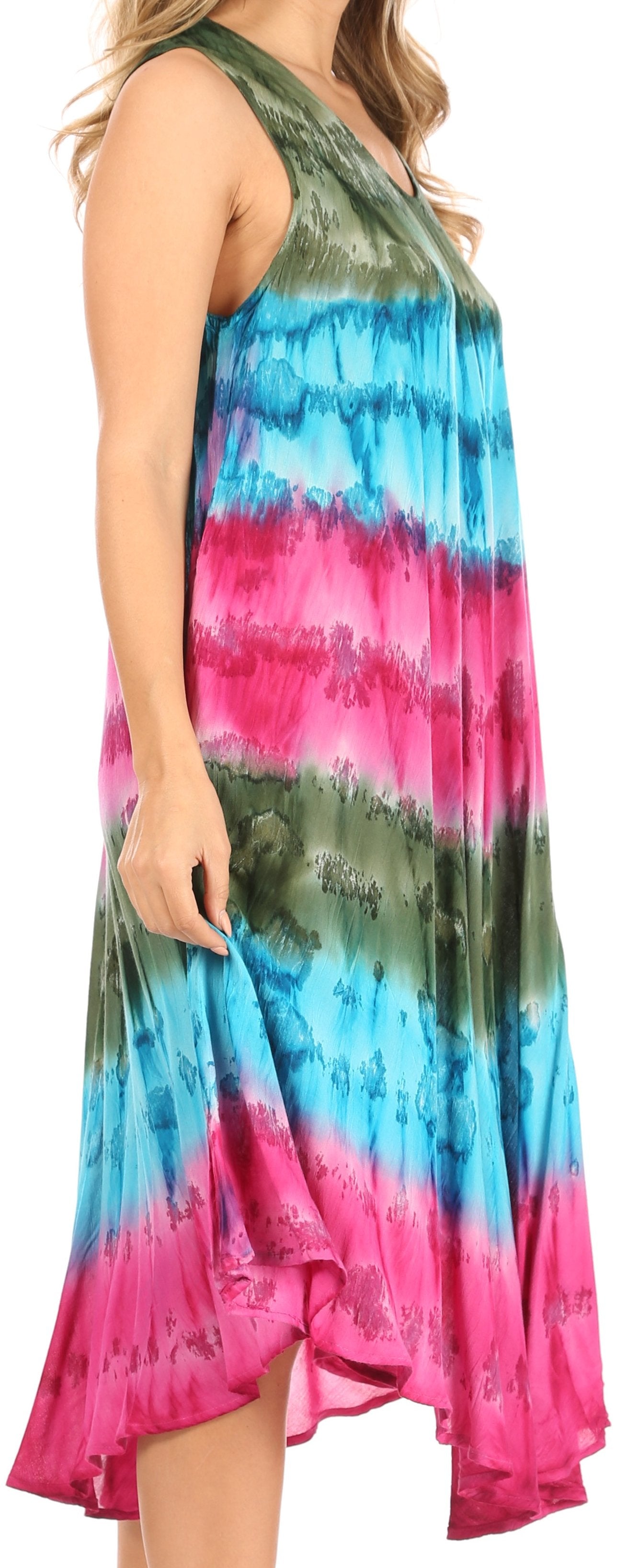 Woman wearing a colorful tie-dye dress with a sleeveless design.