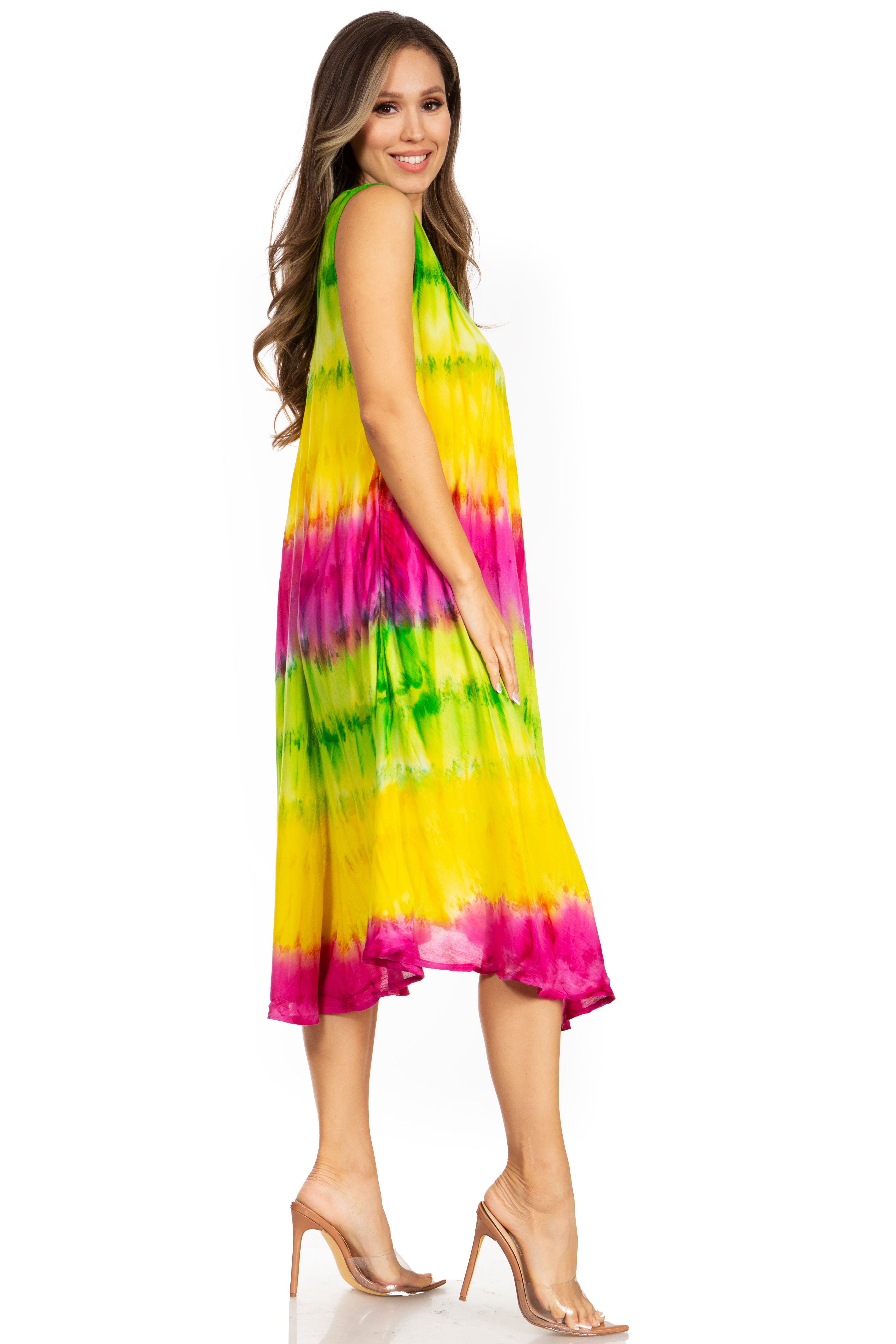 Woman wearing a colorful tie-dye dress on a white background