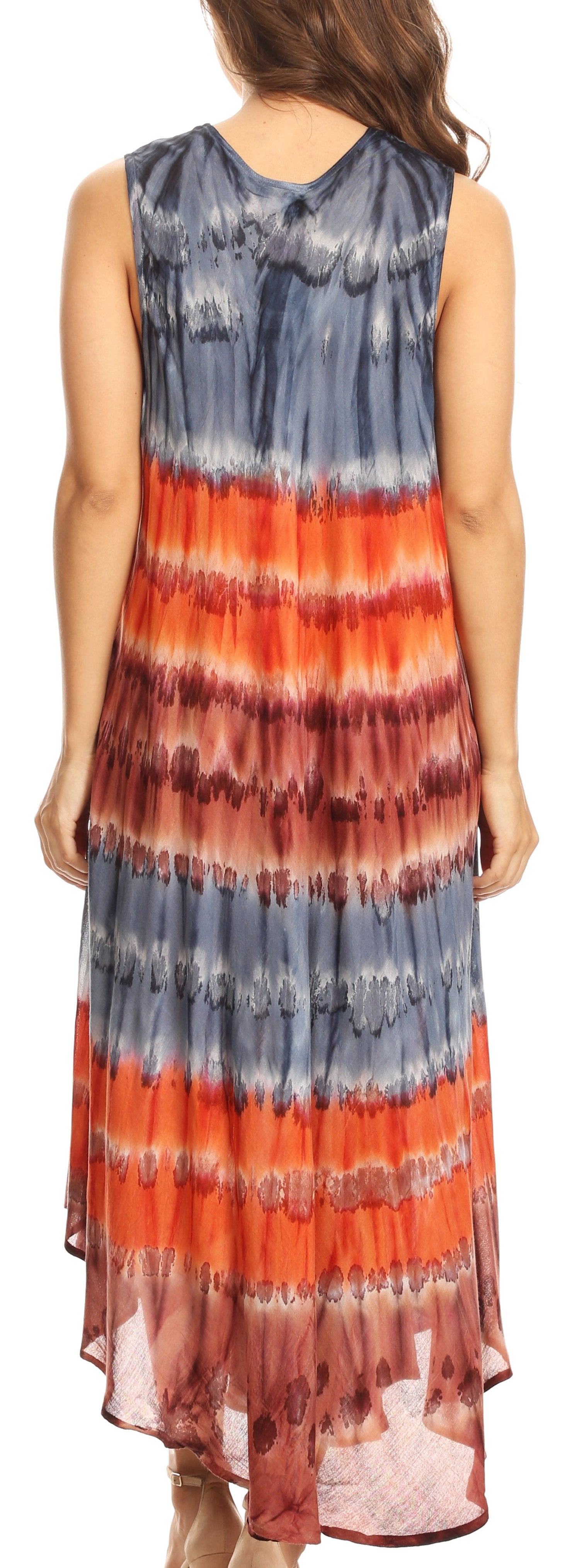 Woman wearing a tie-dye dress with blue and orange patterns.