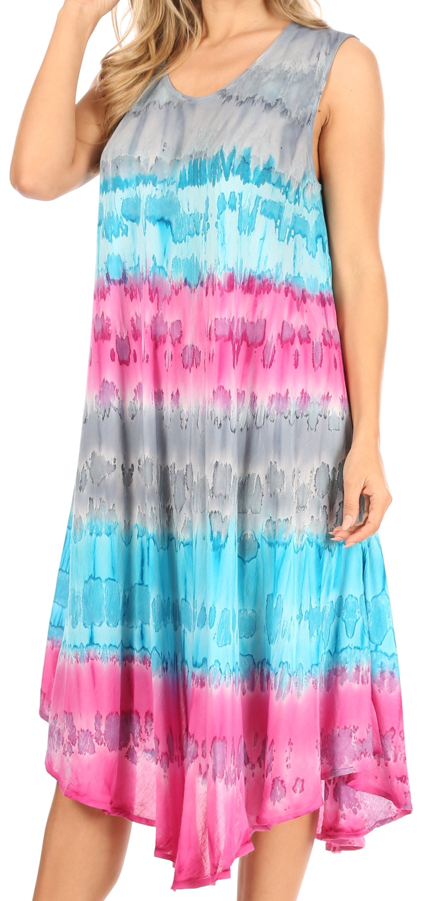 Woman wearing a colorful tie-dye dress on a white background