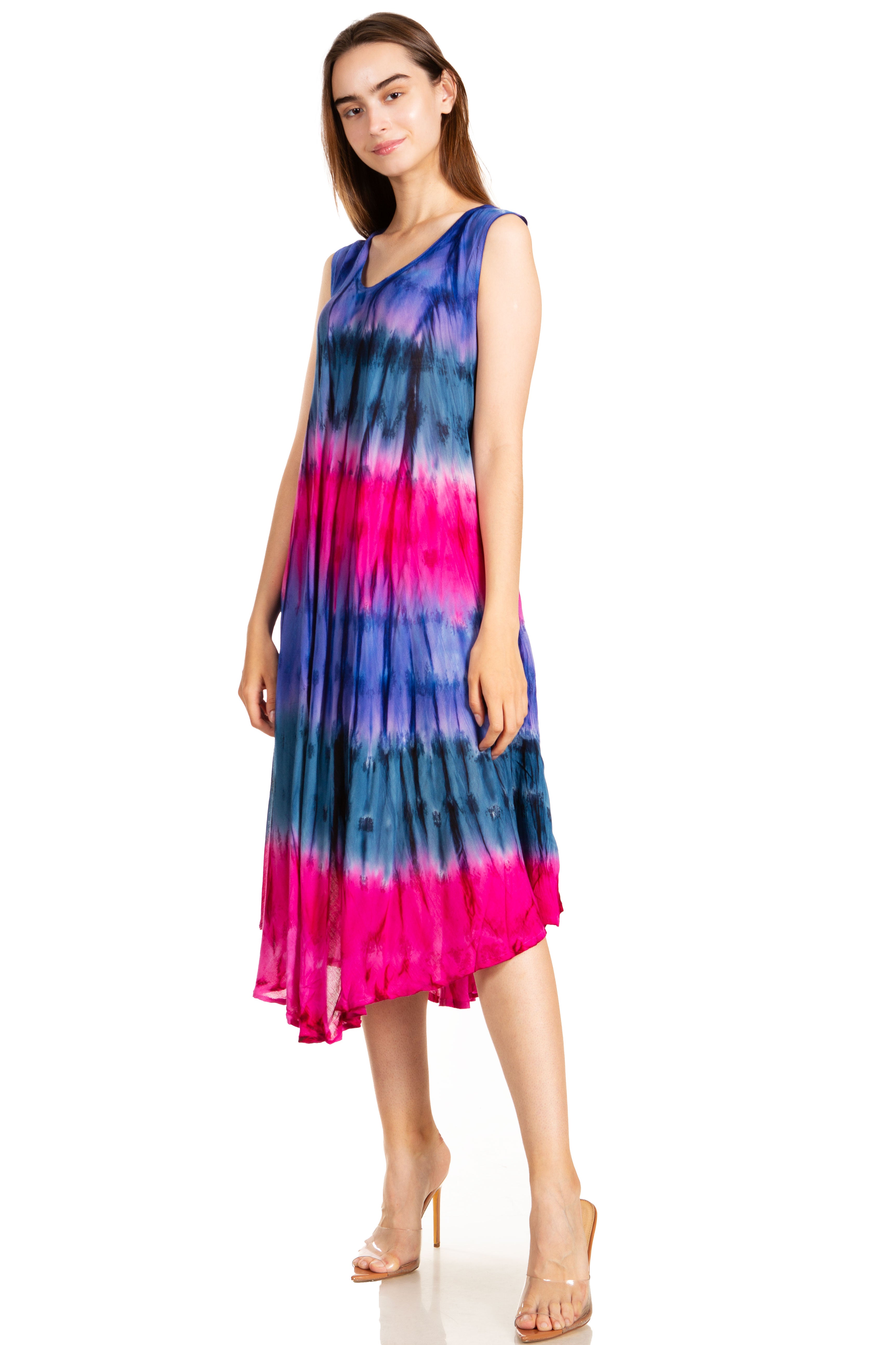 Woman wearing a tie-dye dress with blue and pink gradient on a white background