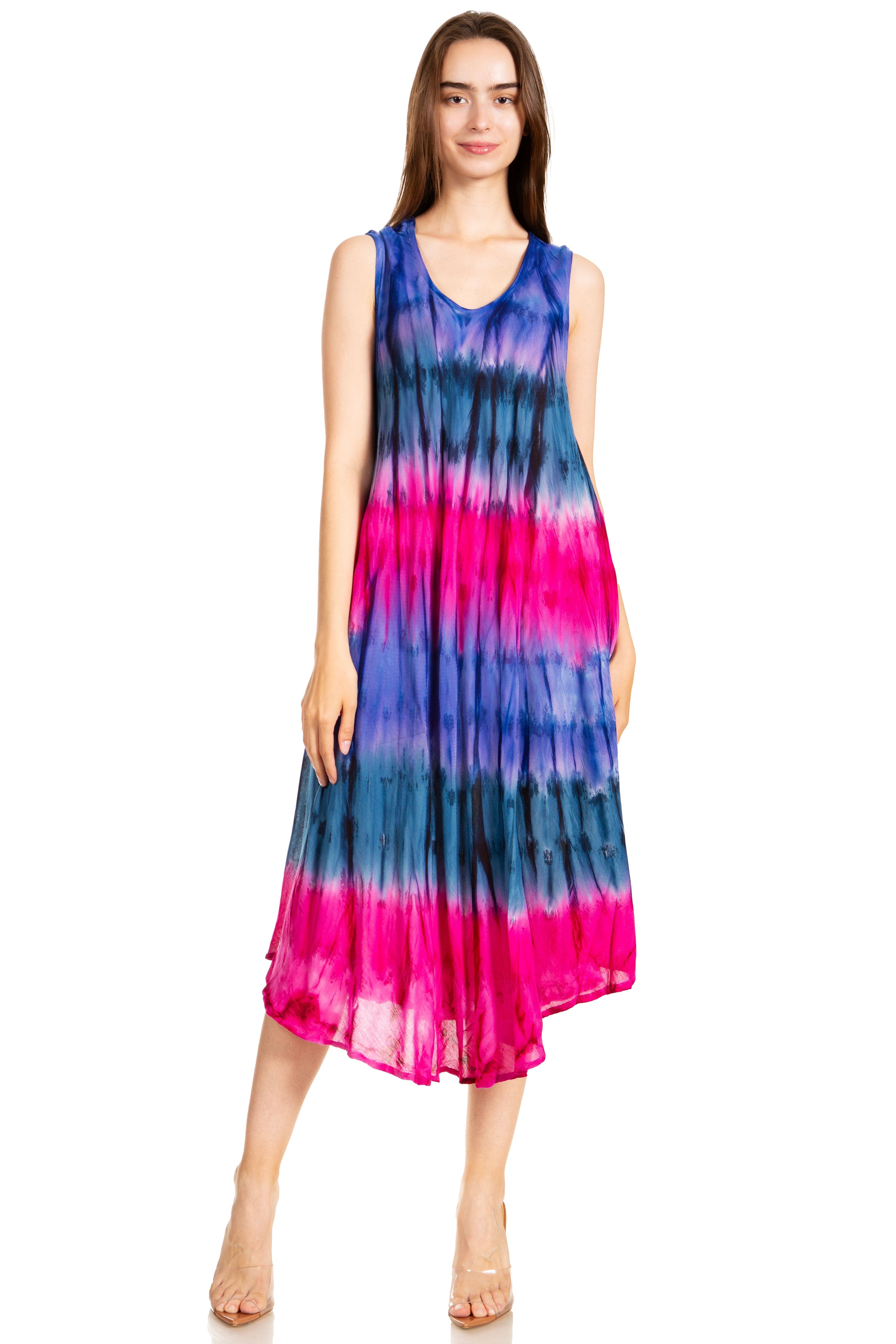 Woman wearing a sleeveless dress with a tie-dye pattern on a white background