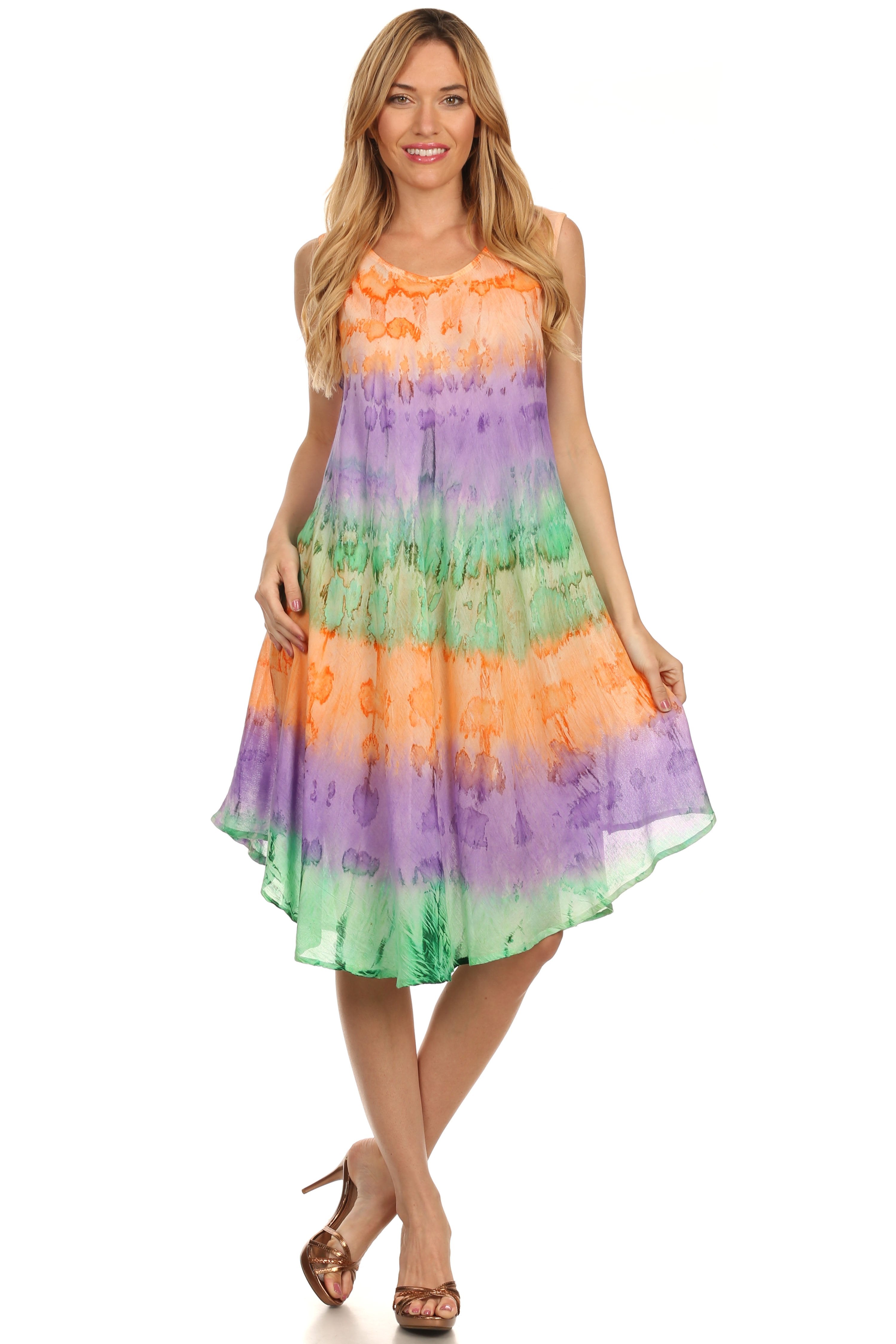 Woman wearing a colorful tie-dye dress on a white background