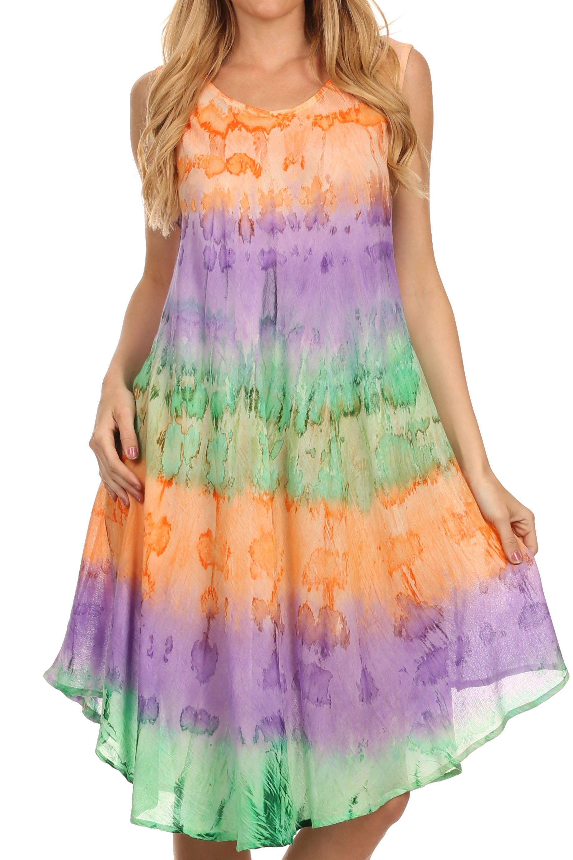 Woman wearing a colorful tie-dye dress on a white background