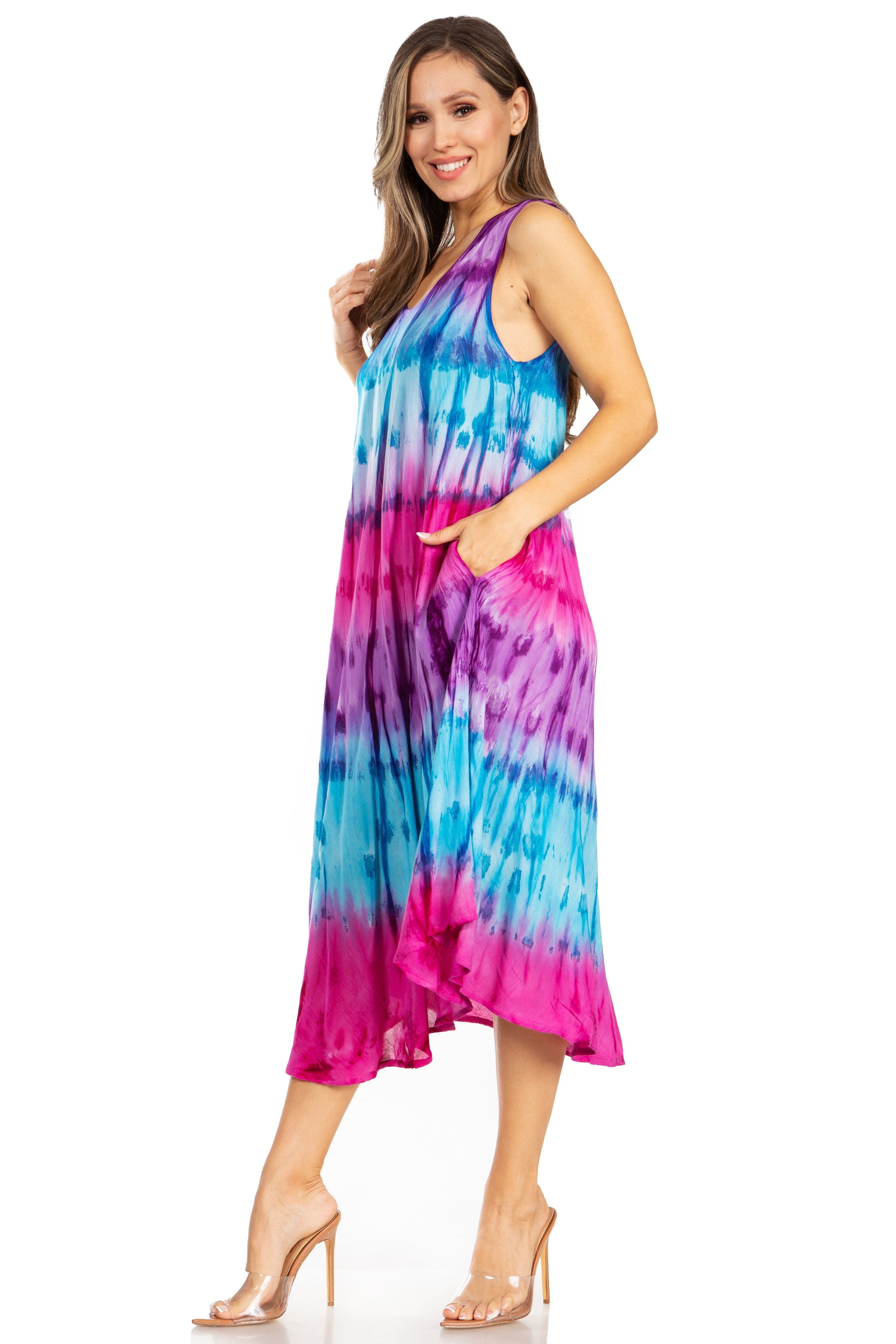 Woman wearing a tie-dye dress with pink and blue gradient on a white background