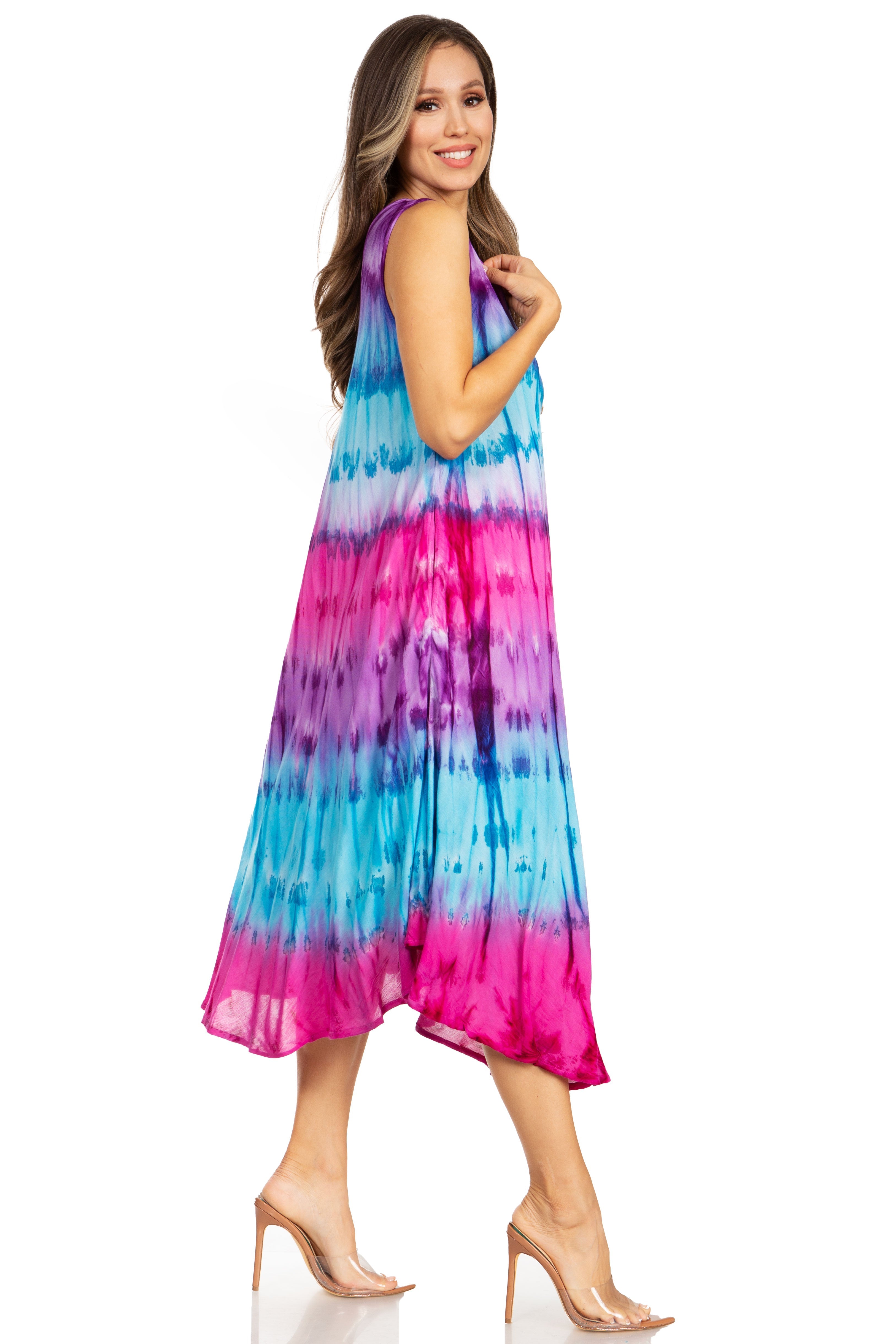 Woman wearing a colorful tie-dye dress on a white background
