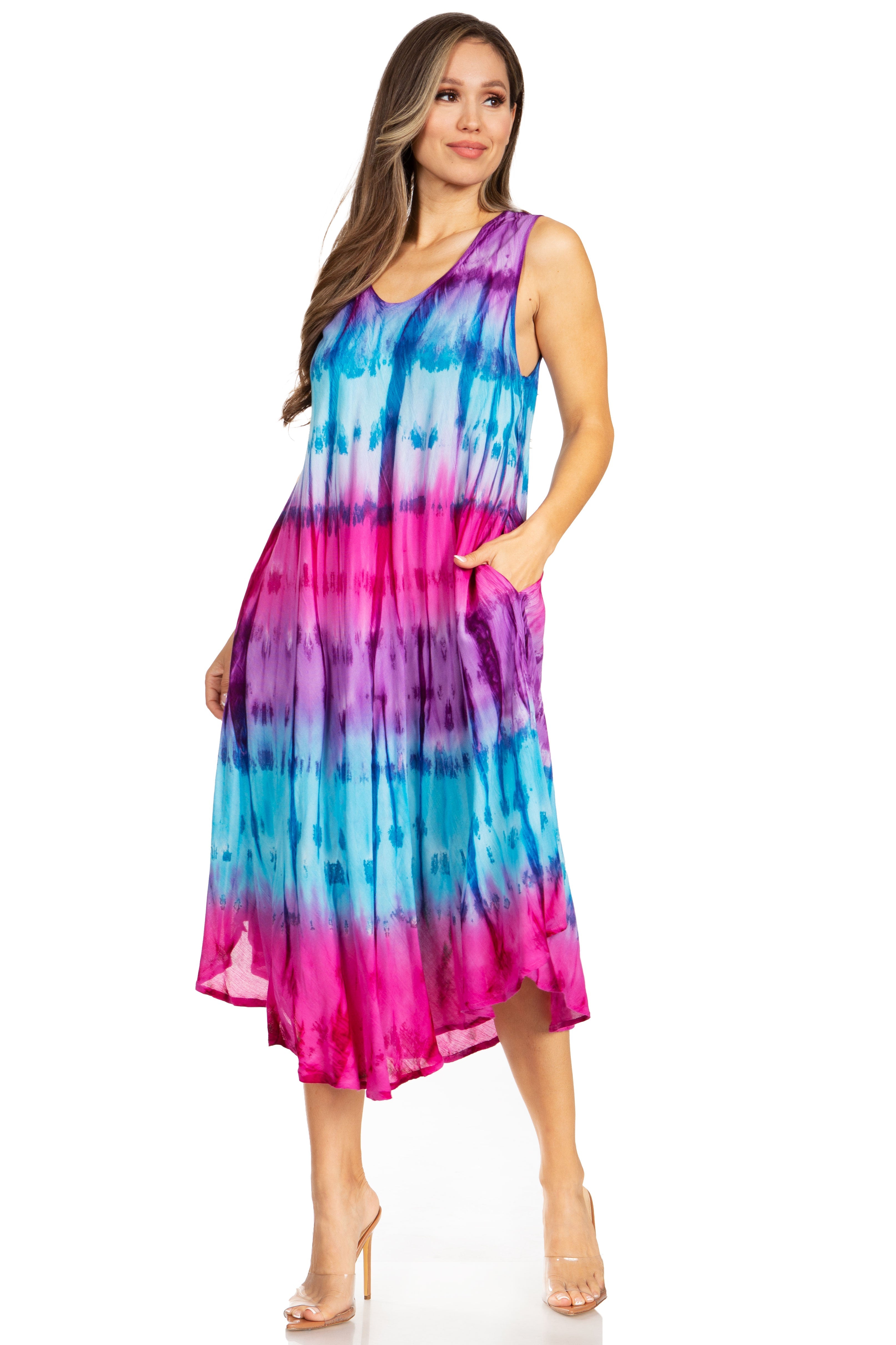 Woman wearing a tie-dye dress with blue and pink gradient on a white background