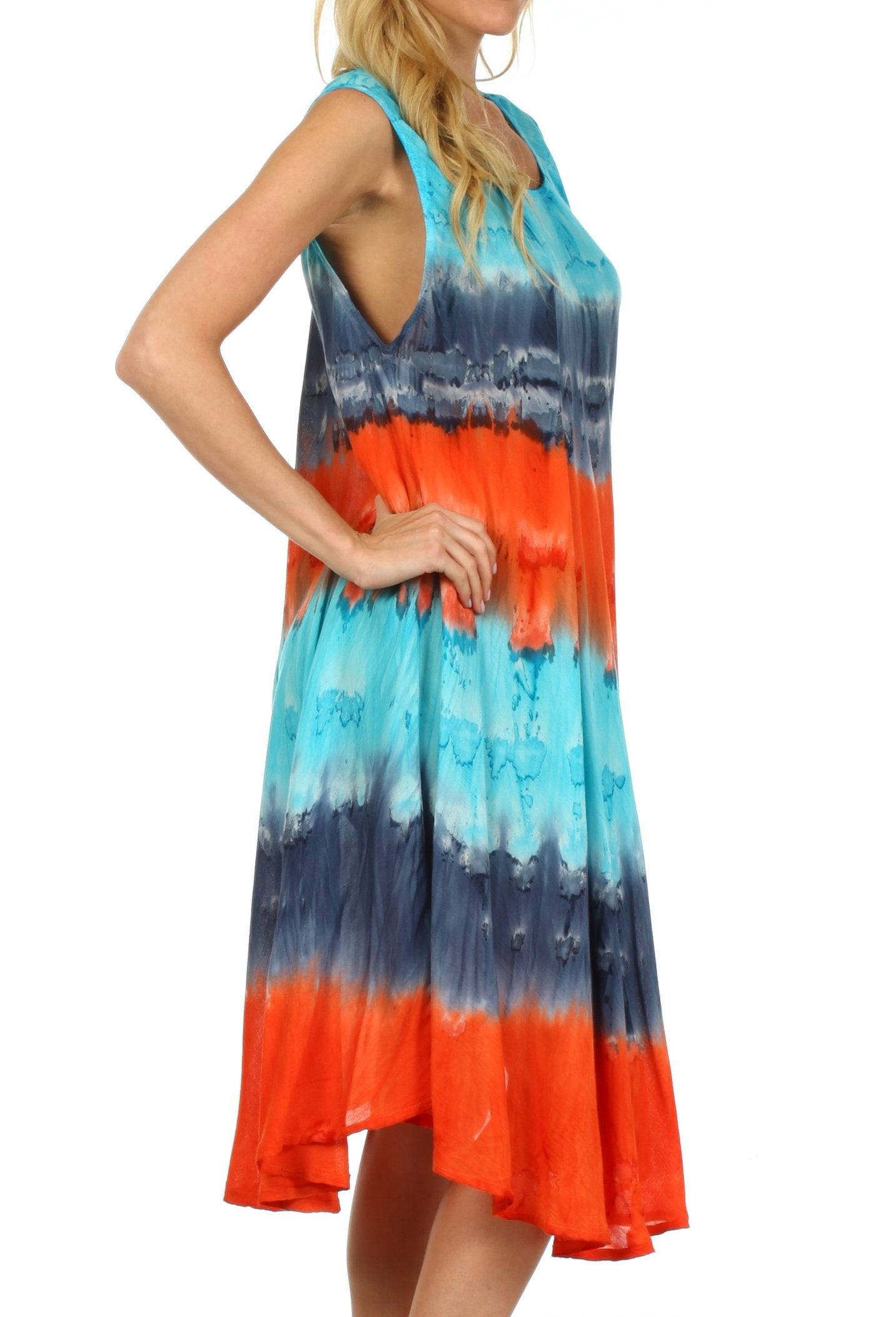 Woman wearing a tie-dye dress with blue and orange gradient on a white background