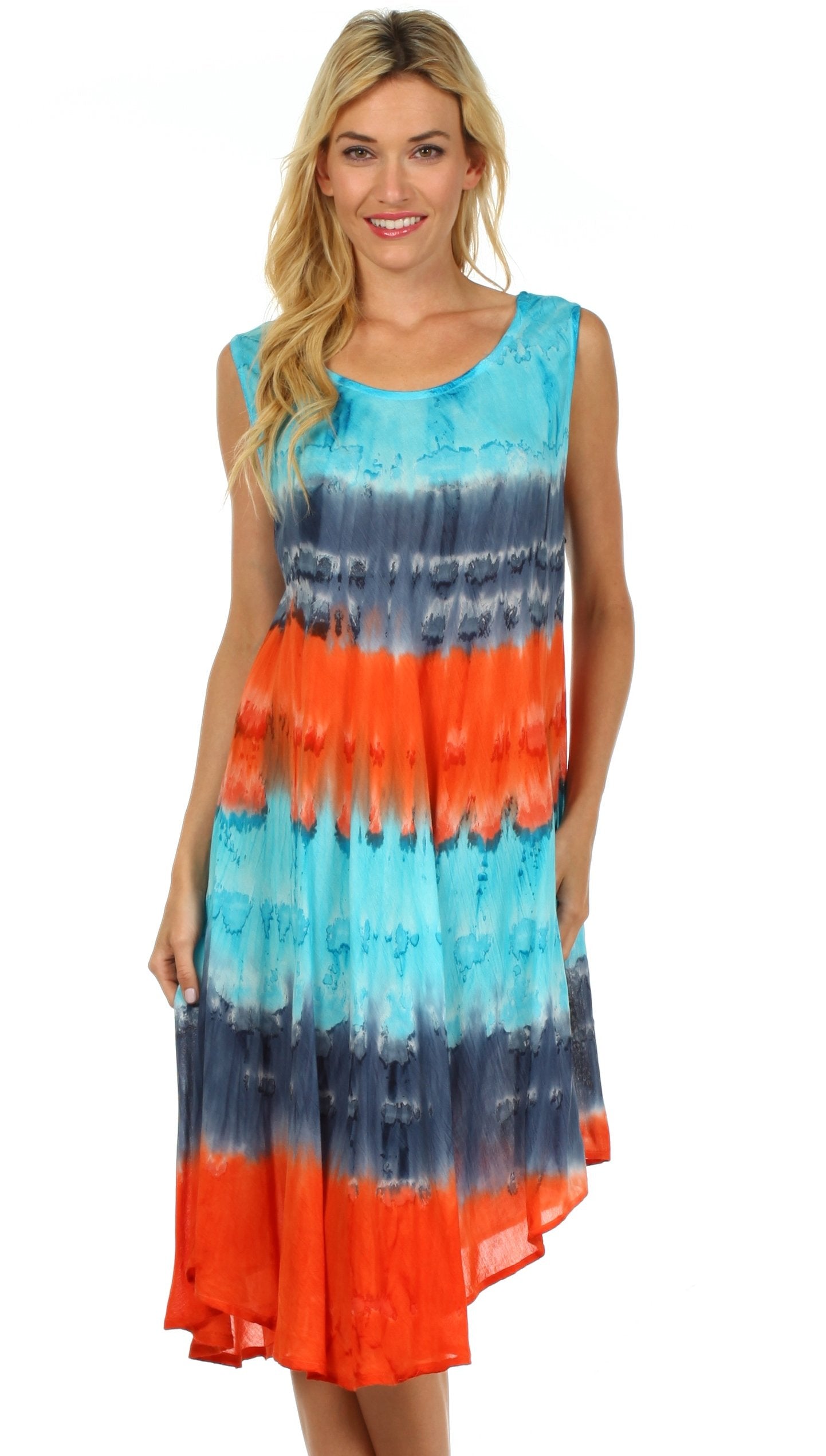 Woman wearing a tie-dye dress with blue, orange, and navy colors on a white background