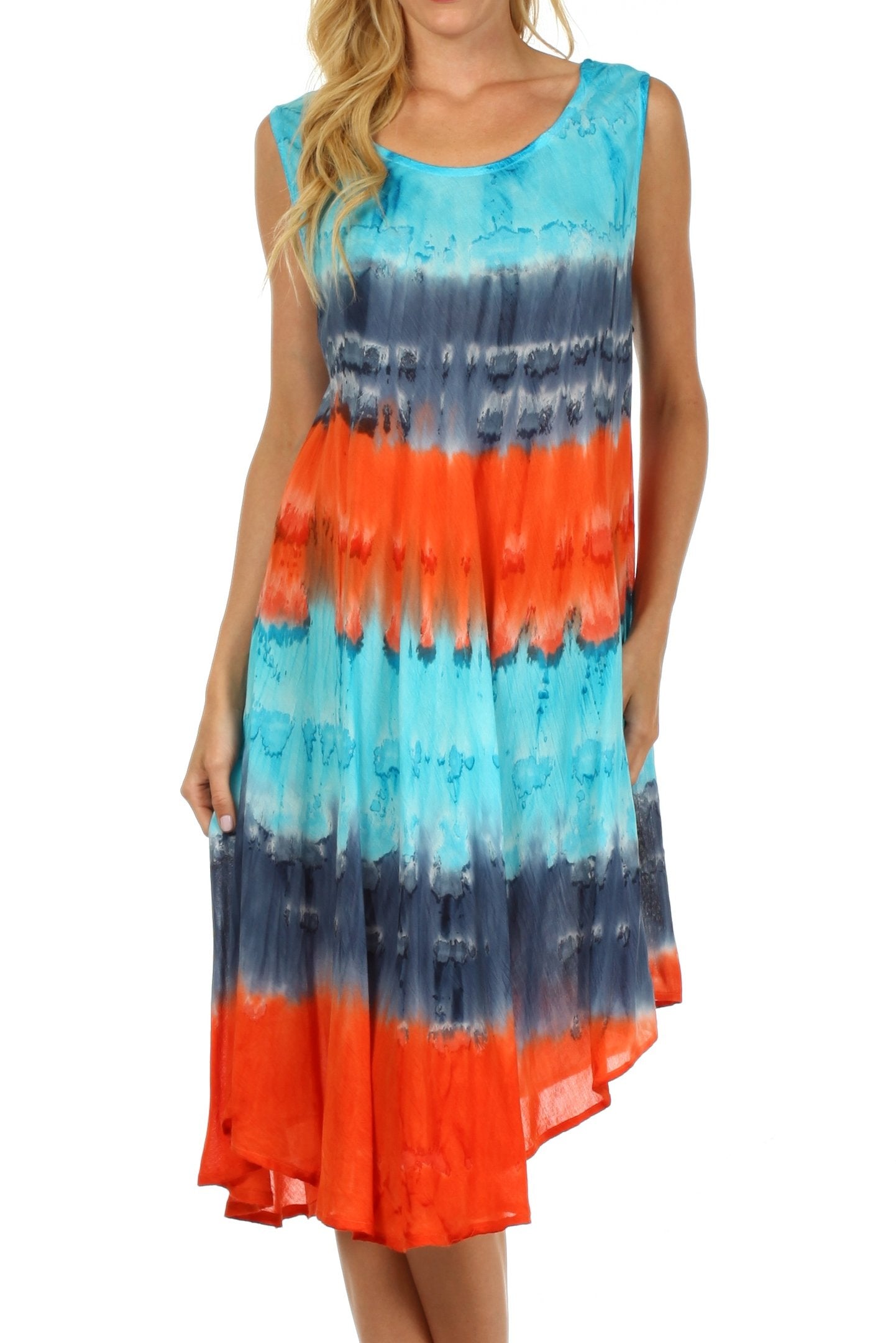 Woman wearing a tie-dye dress with blue and orange stripes on a white background