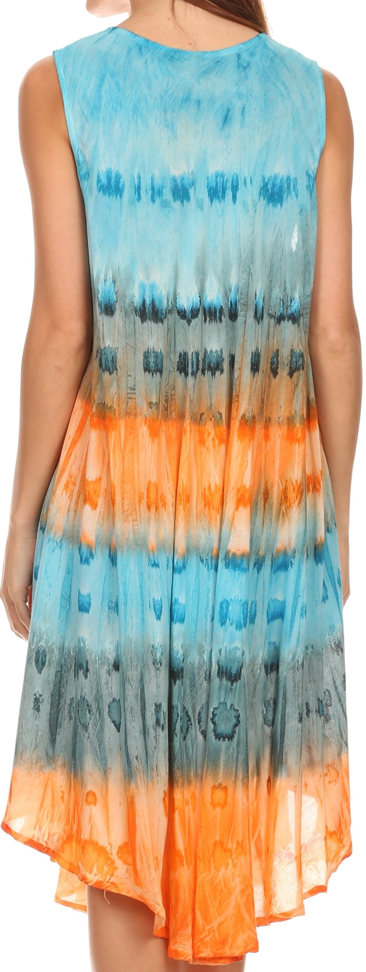Woman wearing a sleeveless dress with a gradient pattern from blue to orange.