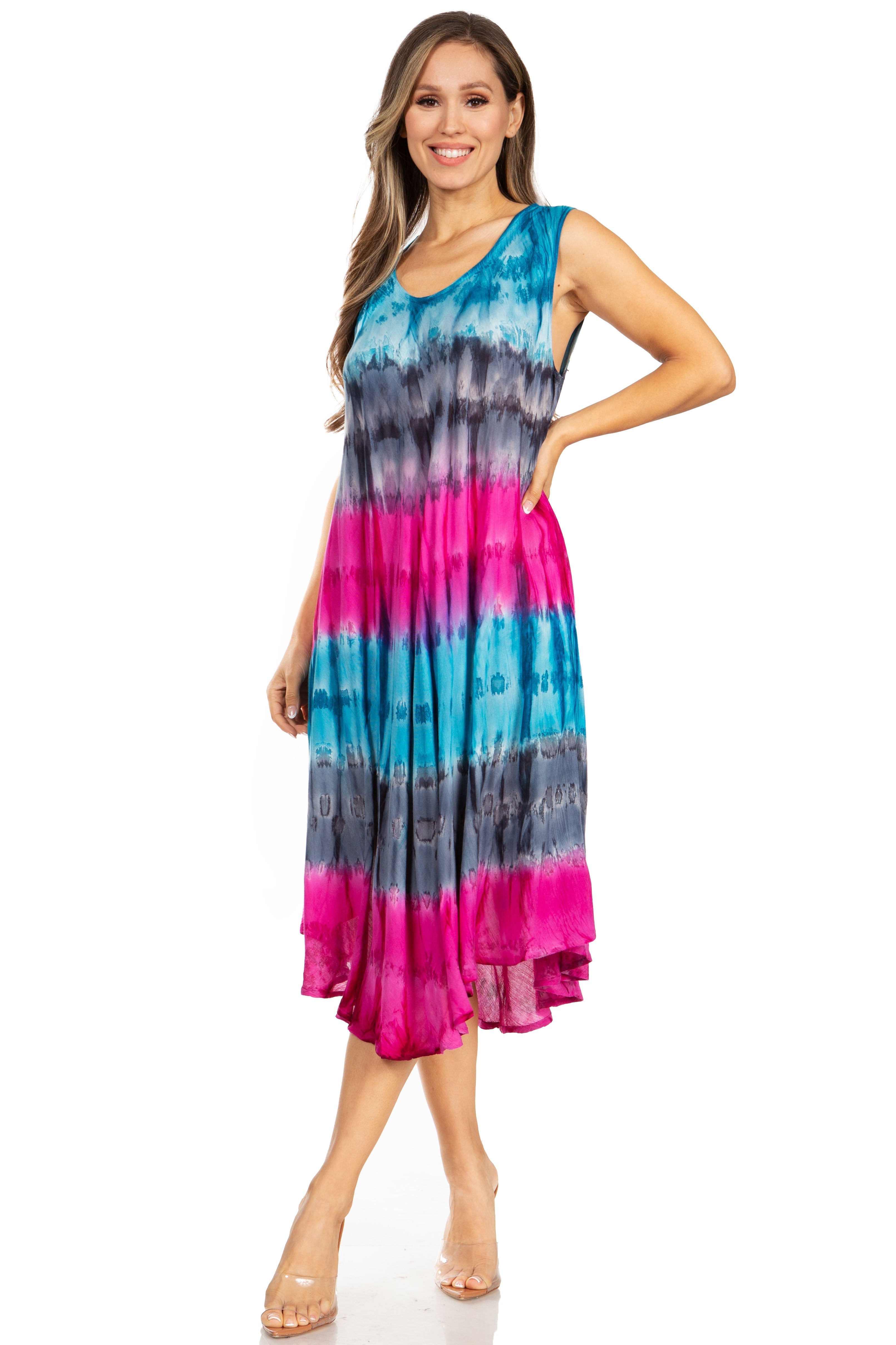 Woman wearing a tie-dye dress with blue, pink, and gray colors on a white background