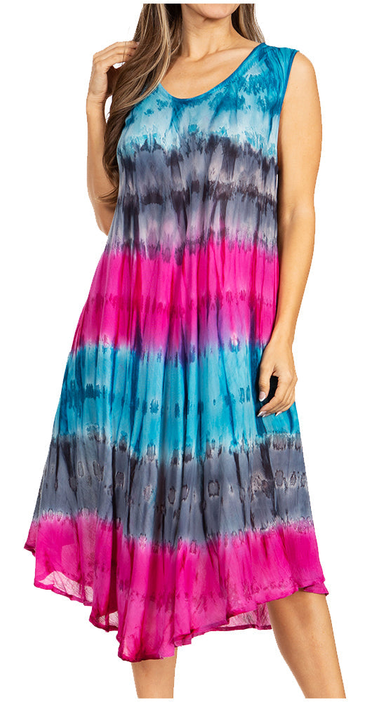 Woman wearing a tie-dye dress with blue, pink, and gray colors on a white background