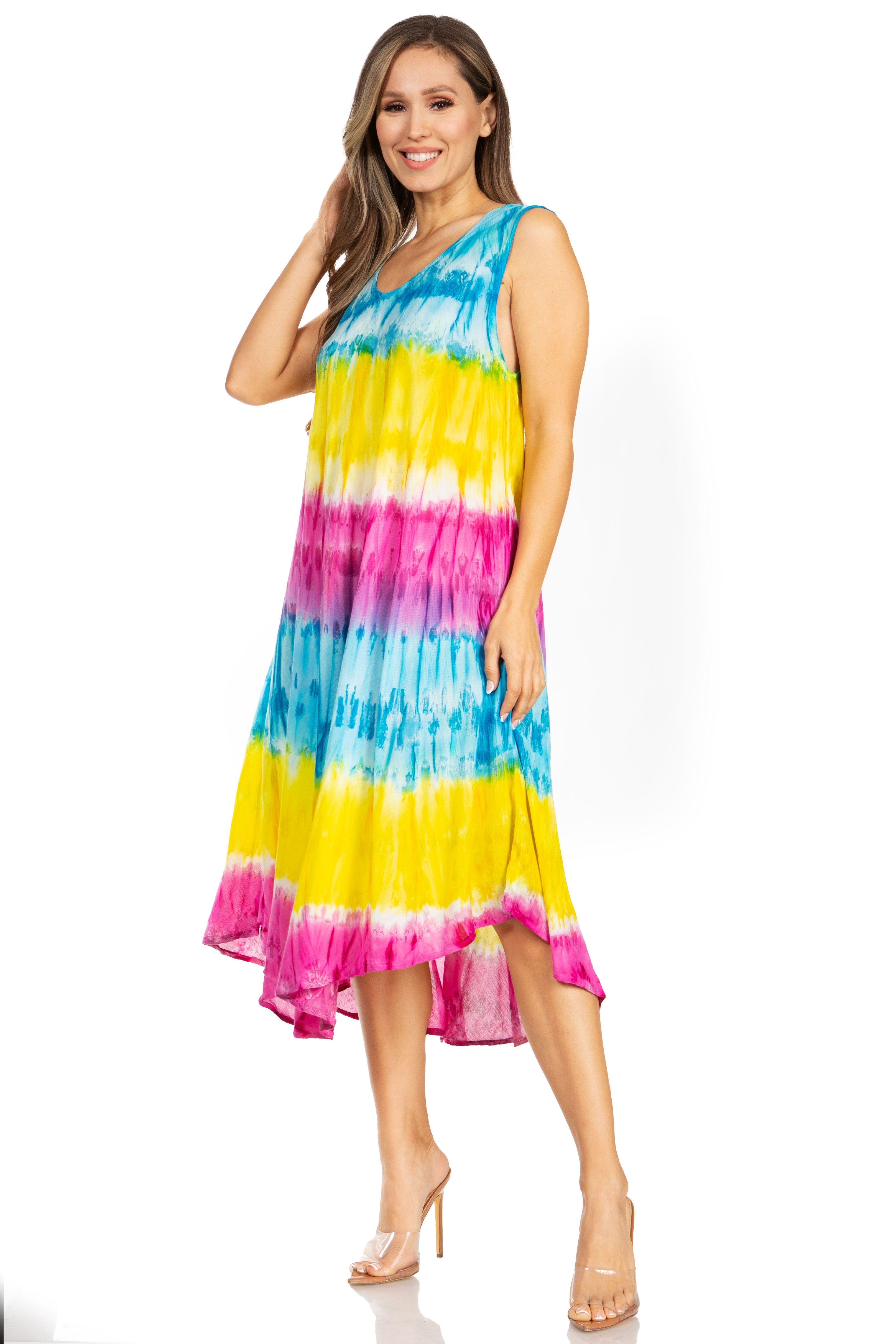 Woman wearing a colorful tie-dye dress on a white background