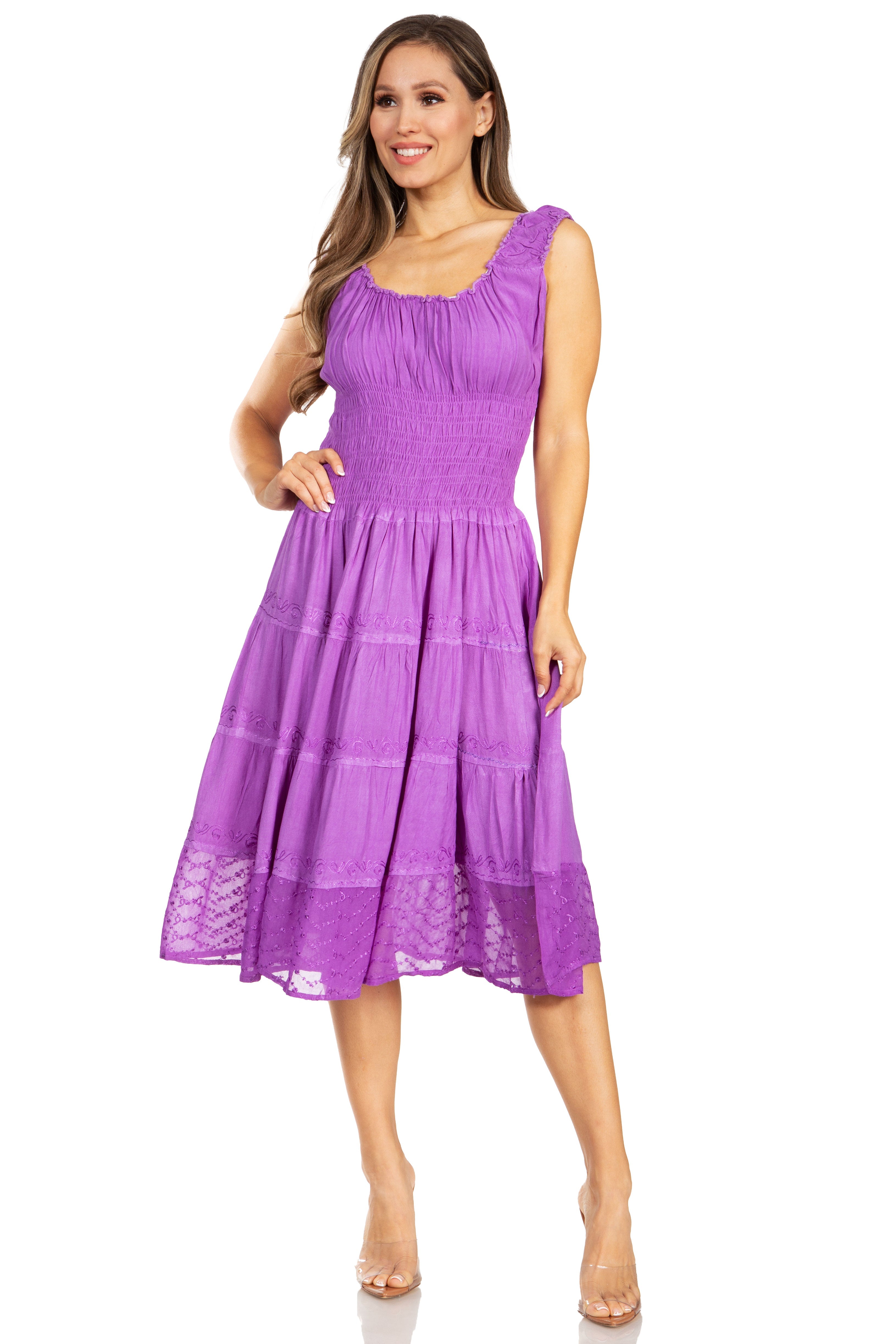 Woman wearing a purple dress on a white background